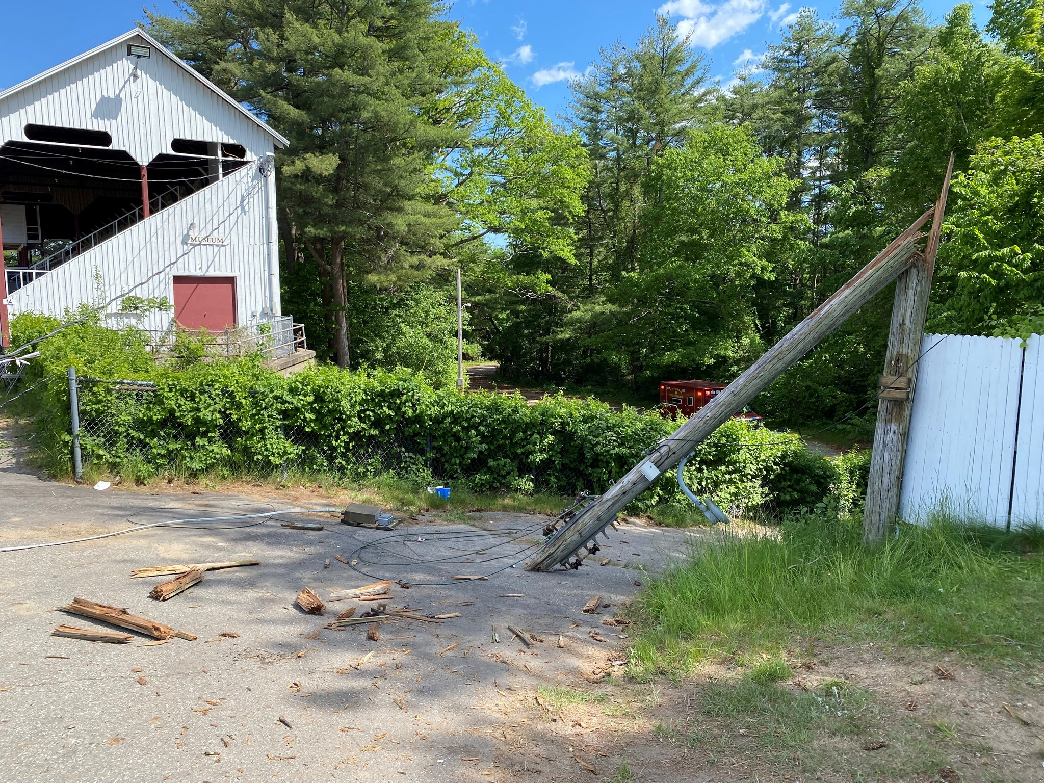 The downed utility pole closest to the track's grandstand at Topsham