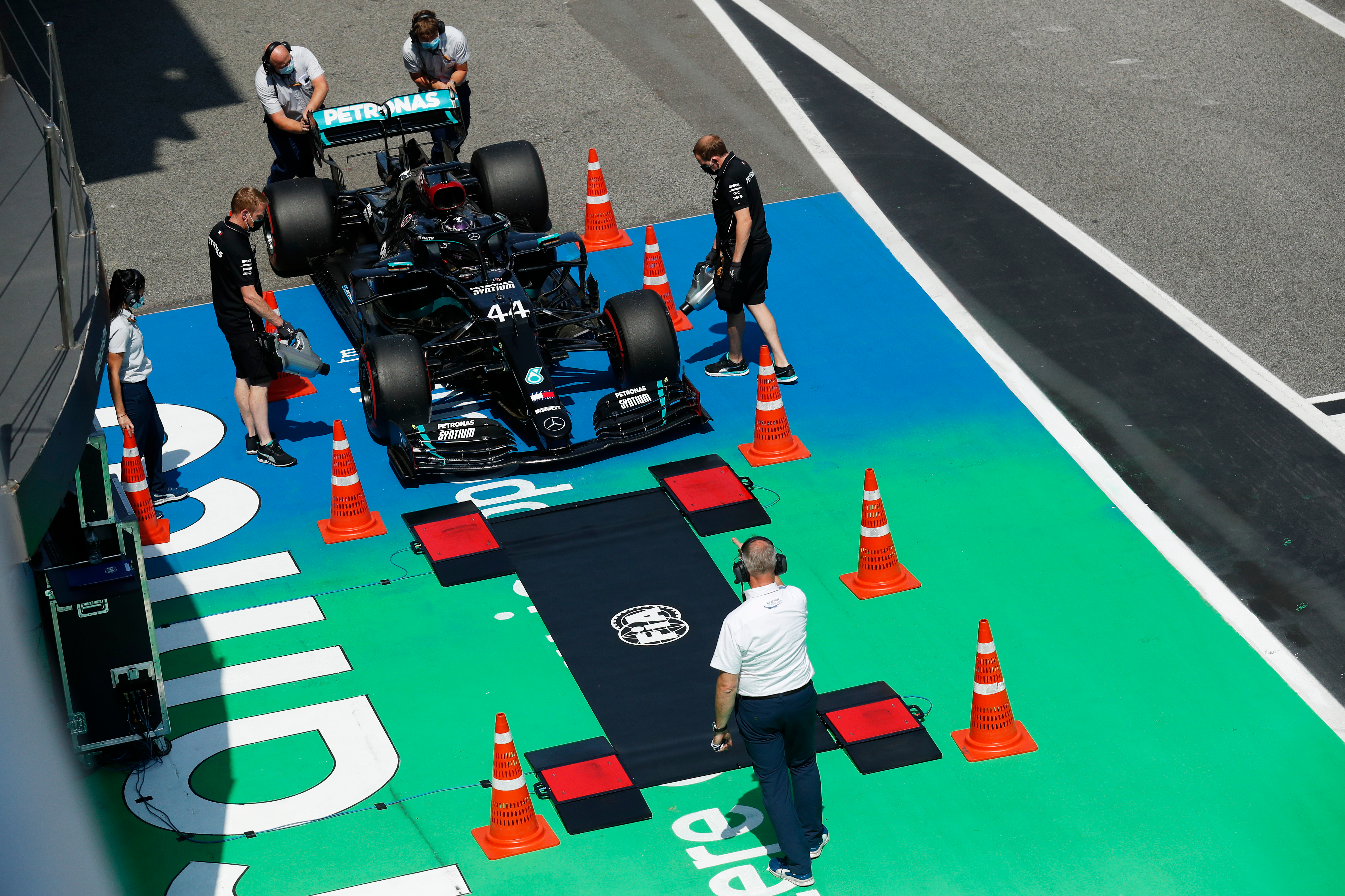 Lewis Hamilton of Great Britain driving the (44) Mercedes AMG Petronas F1 Team Mercedes W11 stops at the weigh bridge during qualifying for the F1 Grand Prix of Spain at Circuit de Barcelona-Catalunya on August 15, 2020