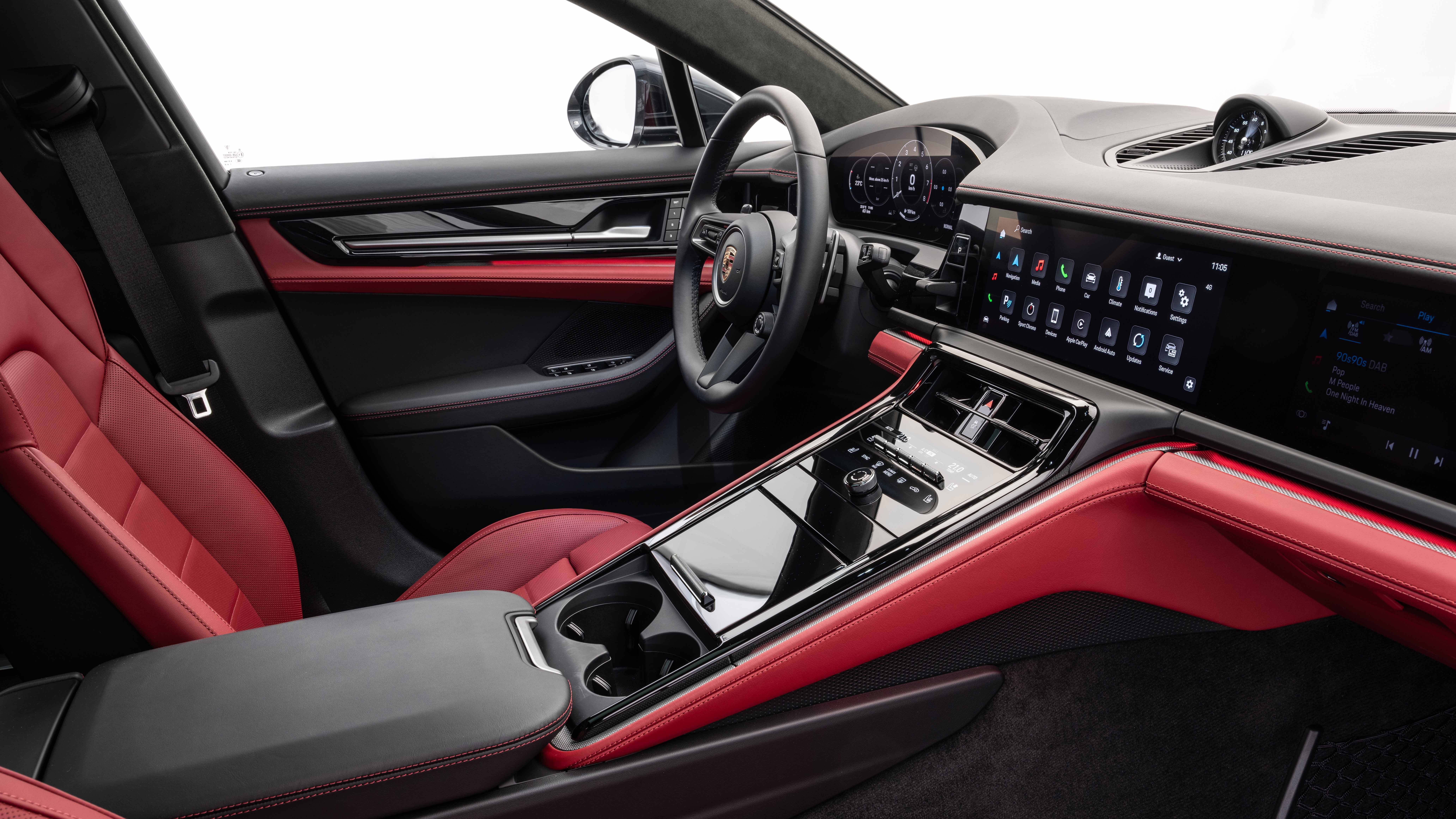 Side-angle view of a red 2024 Porsche Panamera interior