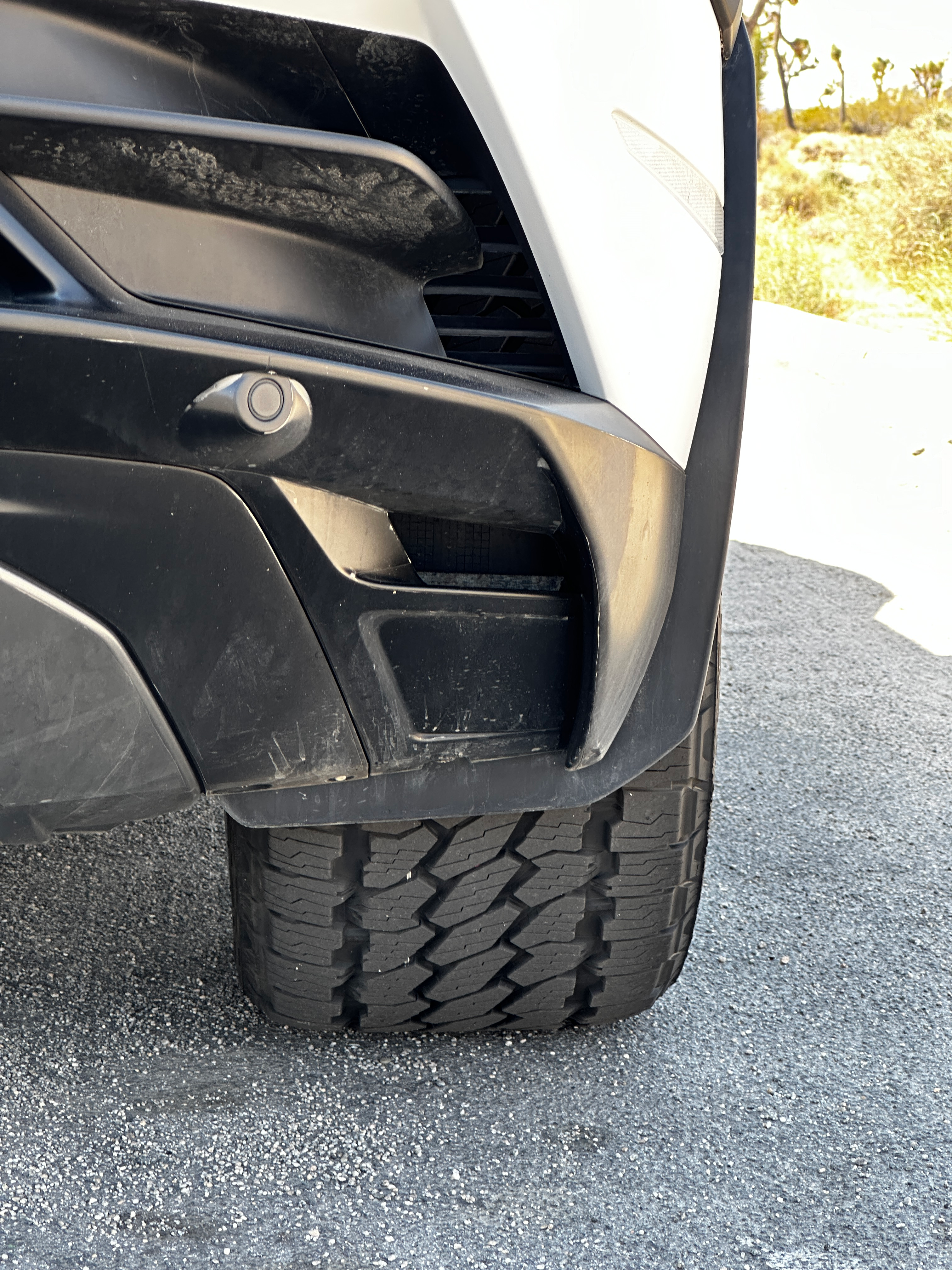 The rear wheel and tire of the 2023 Lamborghini Huracan Sterrato.