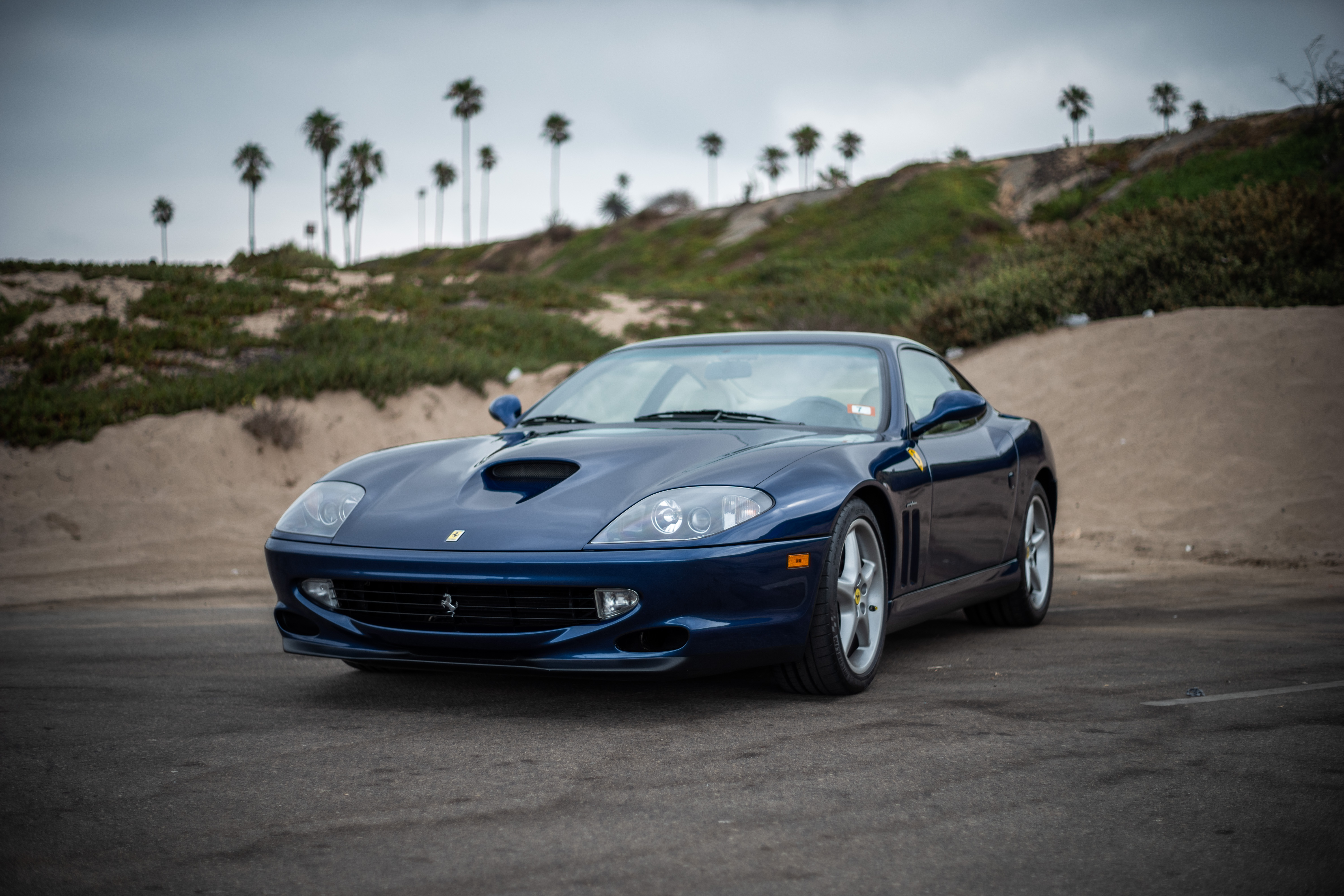 Front view of a blue 1999 Ferrari 550 Maranello