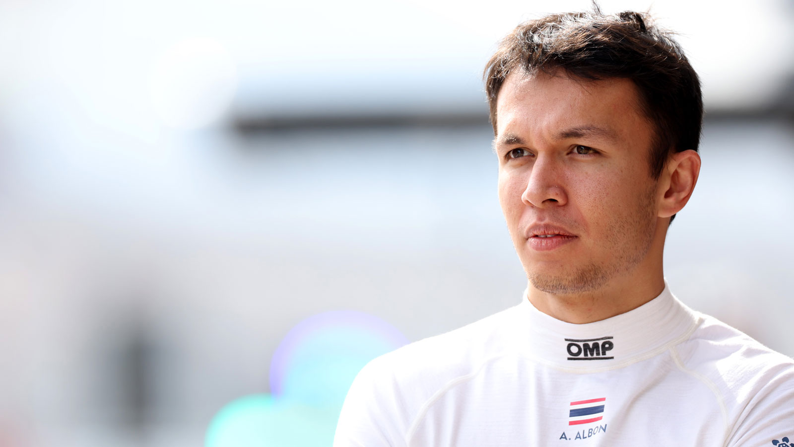 A photo of Alex Albon in his Williams F1 overalls. 