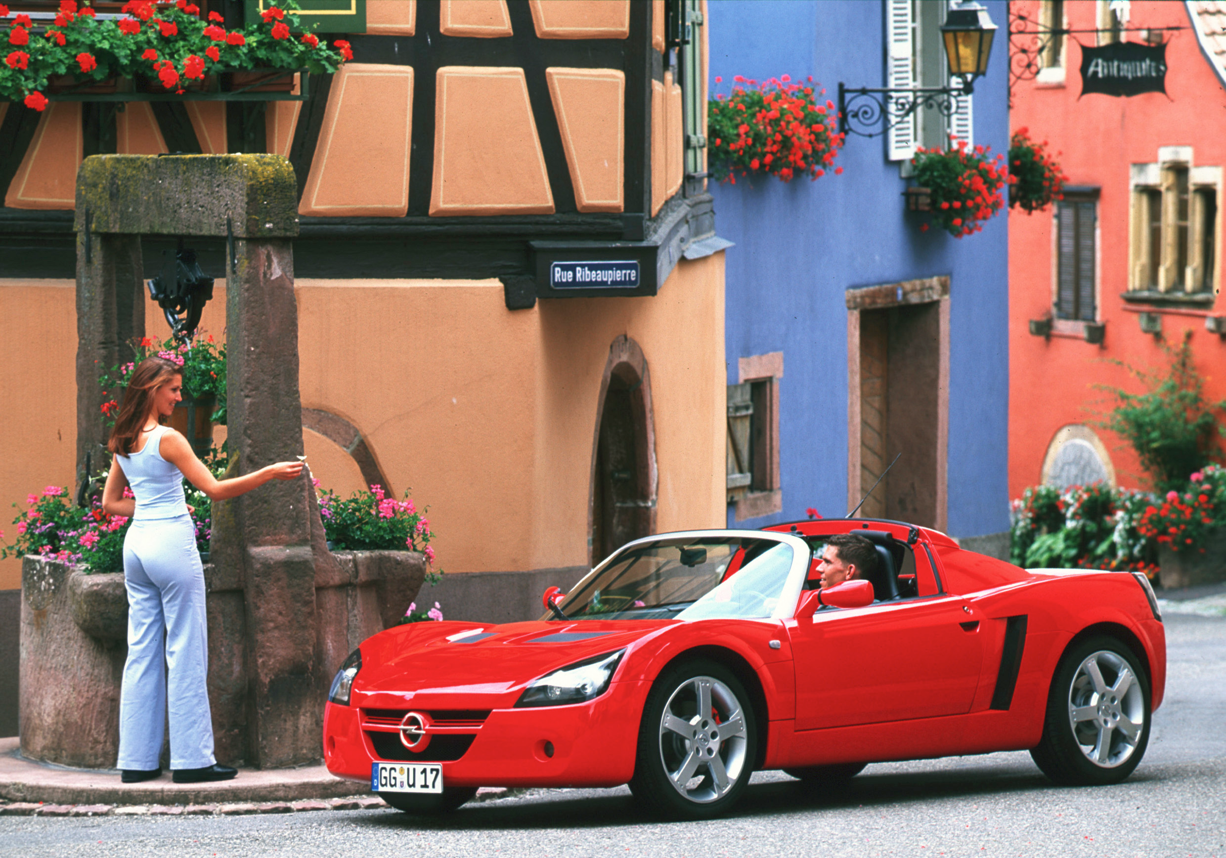 Front 3/4 view of an orange Opel Speedster