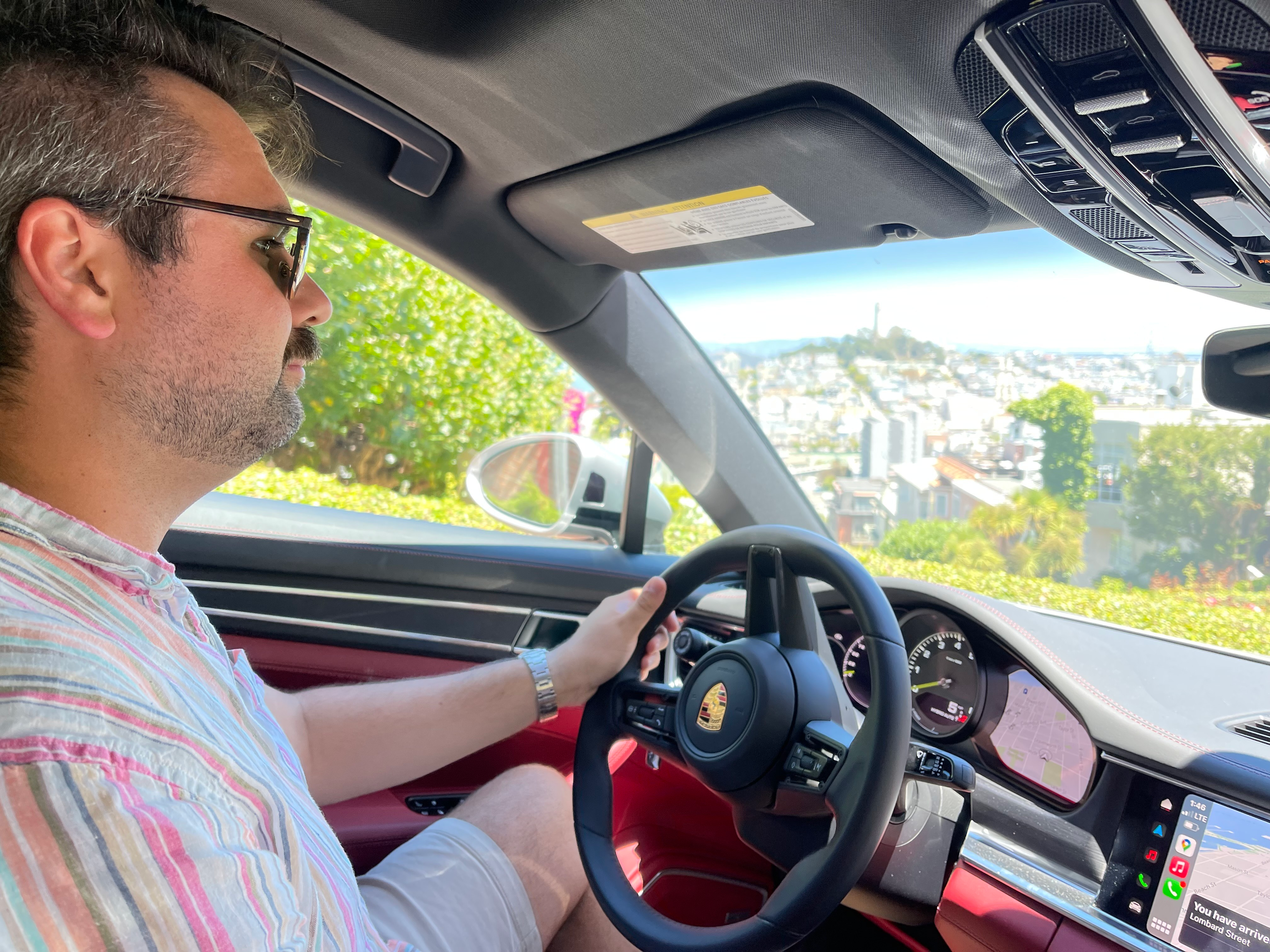 A silver 2022 Porsche Panamera 4 E-Hybrid Platinum Edition