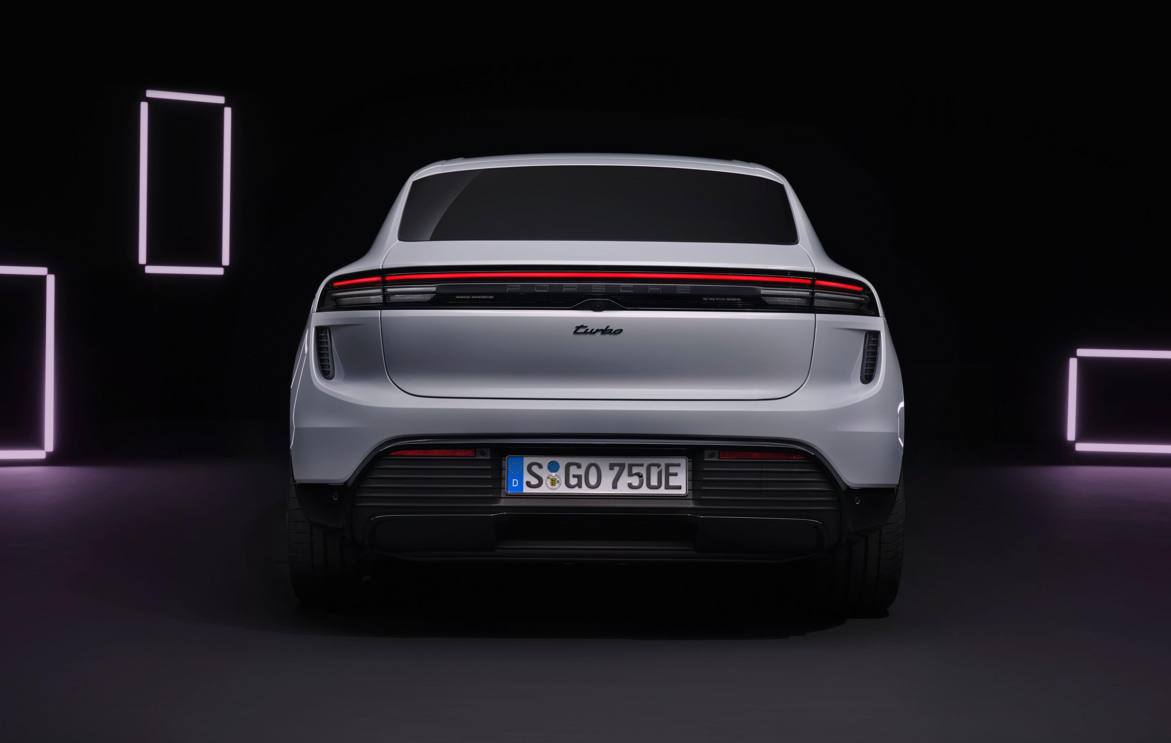 Rear view of a white 2024 Porsche Macan EV