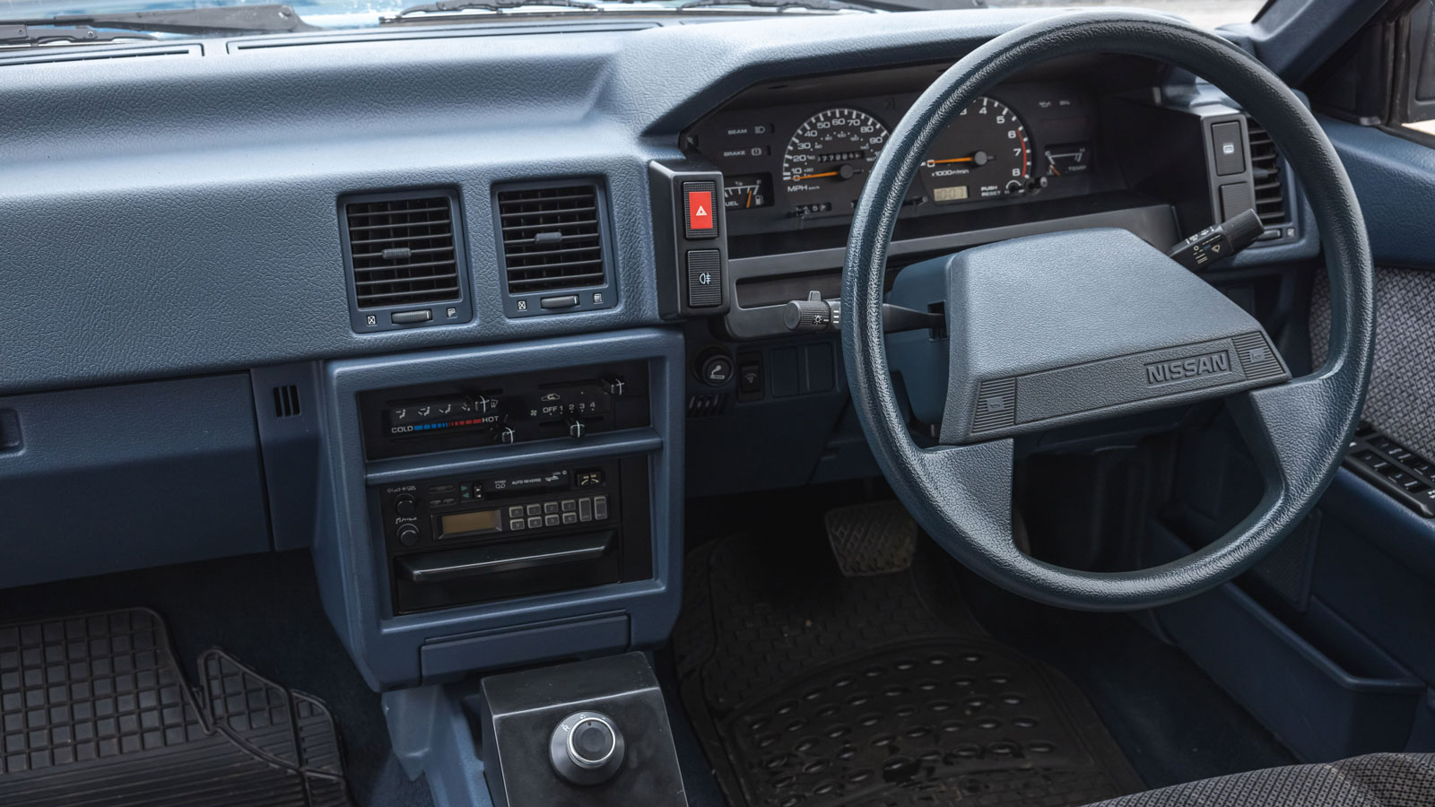 The grey interior of the Nissan Newbird EV 