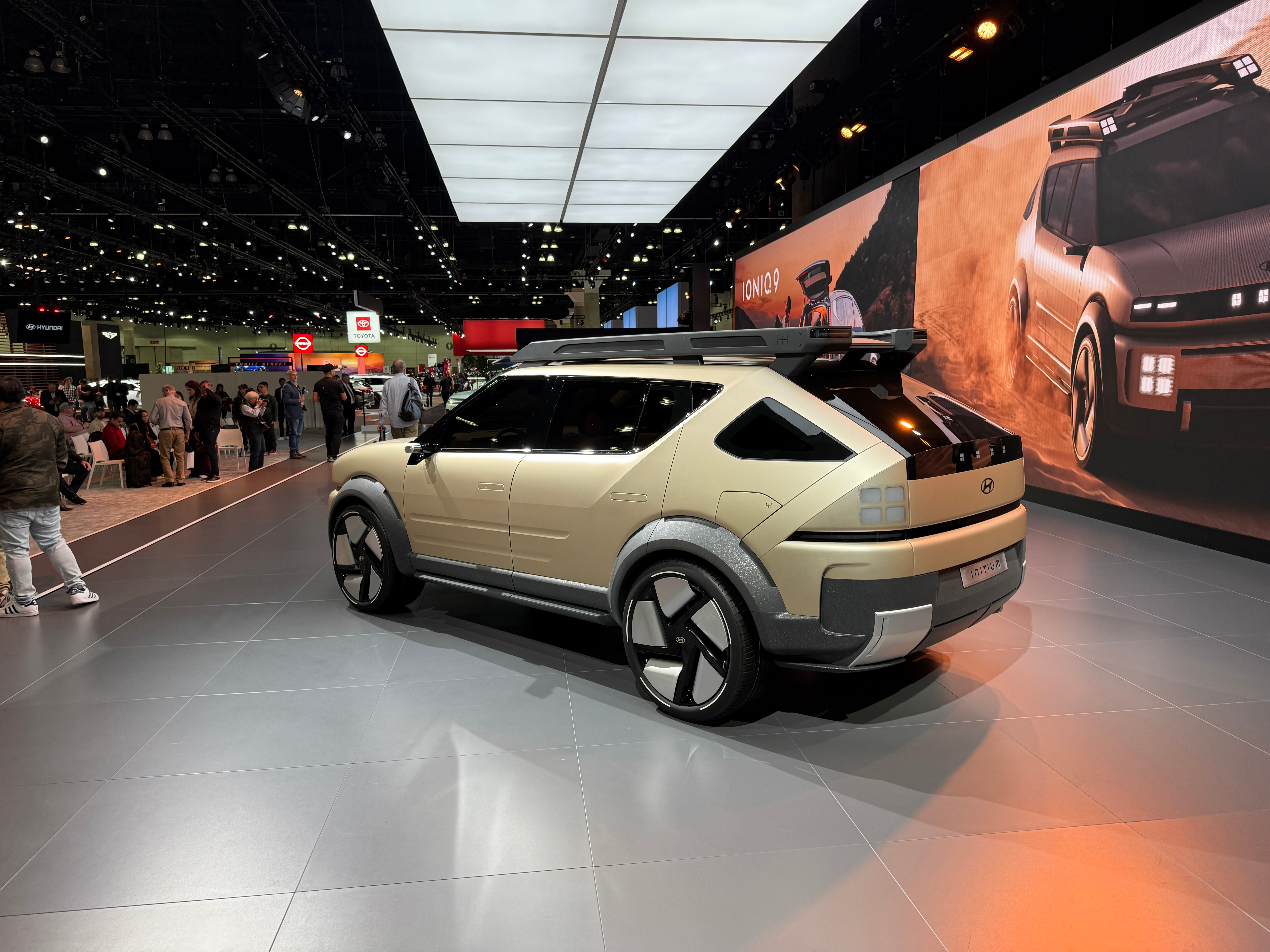 Rear 3/4 view of the beige Hyundai Initium concept