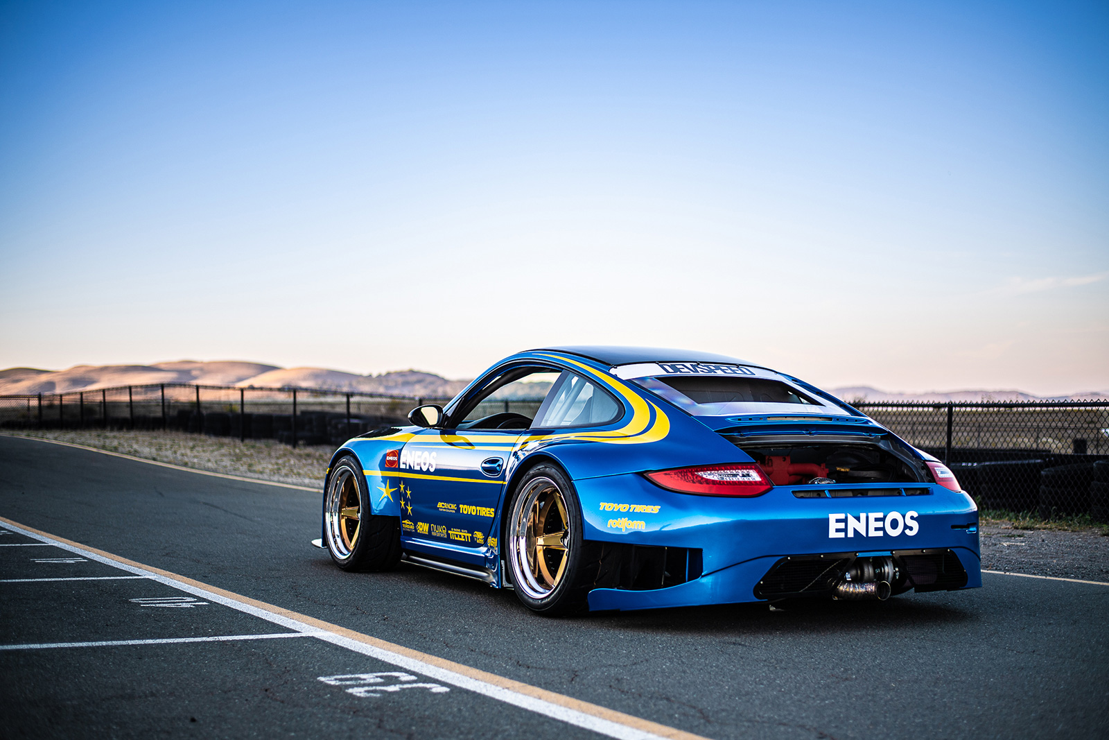 Rear quarter view of Porsche 911 GT3 STI built by DevSpeed Motorsports for Eneos.