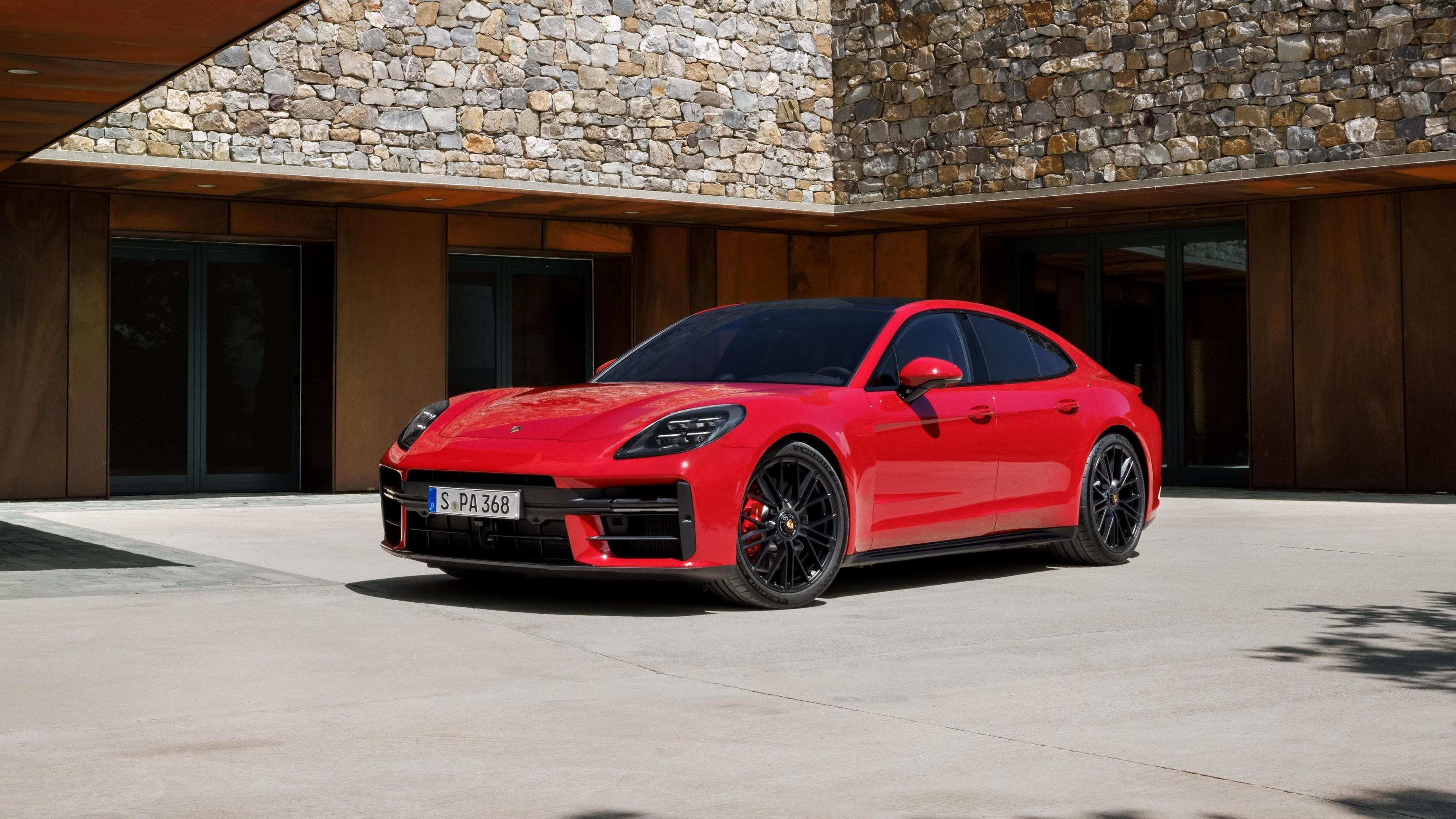 Front 3/4 view of a red Porsche Panamera GTS