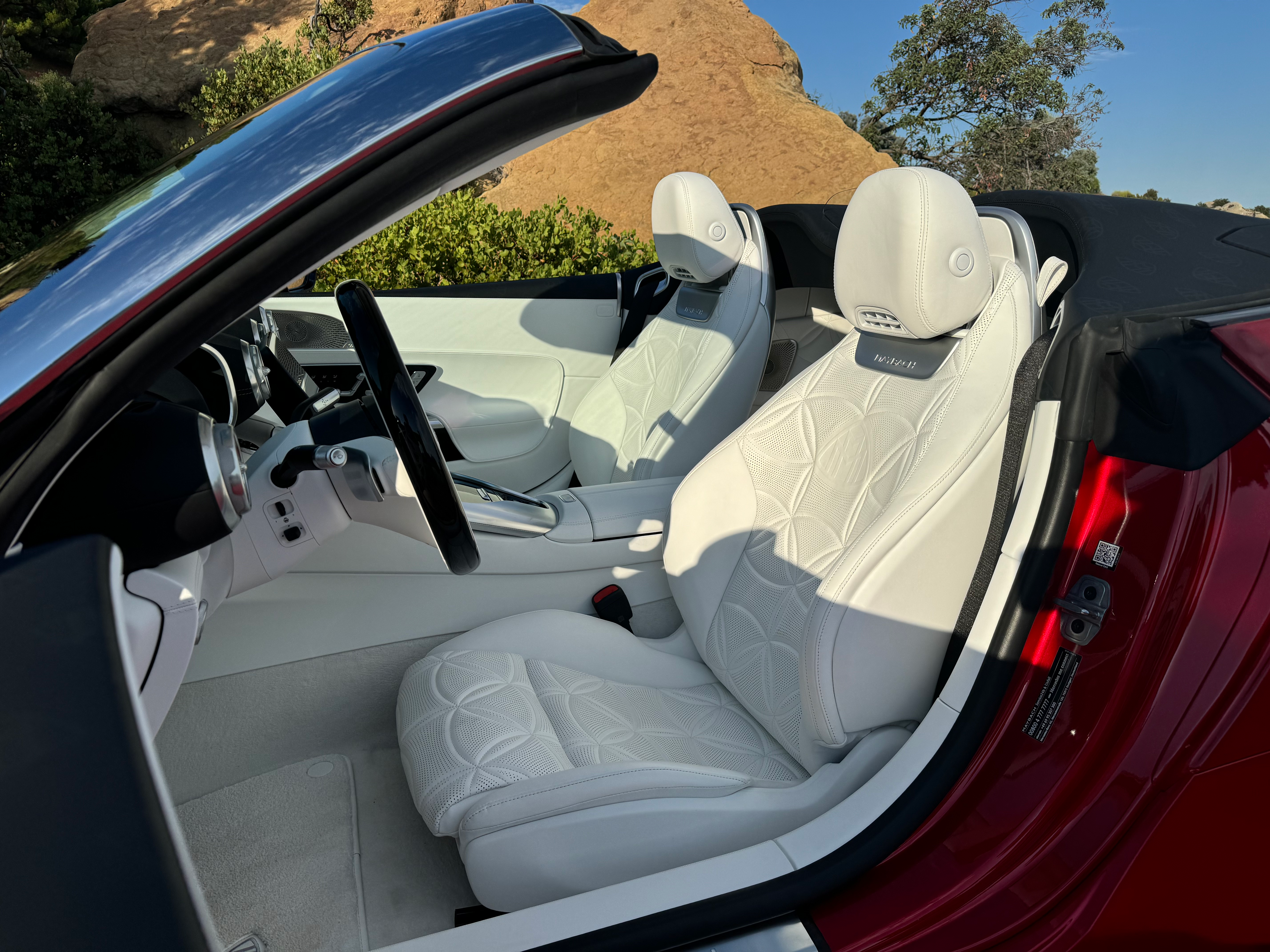 Front seats of a red Mercedes-Maybach SL680 Monogram Series