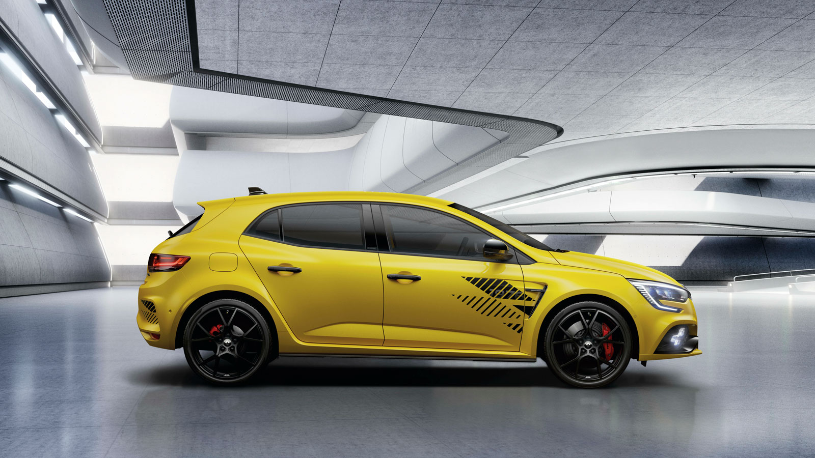 A profile image of the yellow Renault Megane hatchback. 