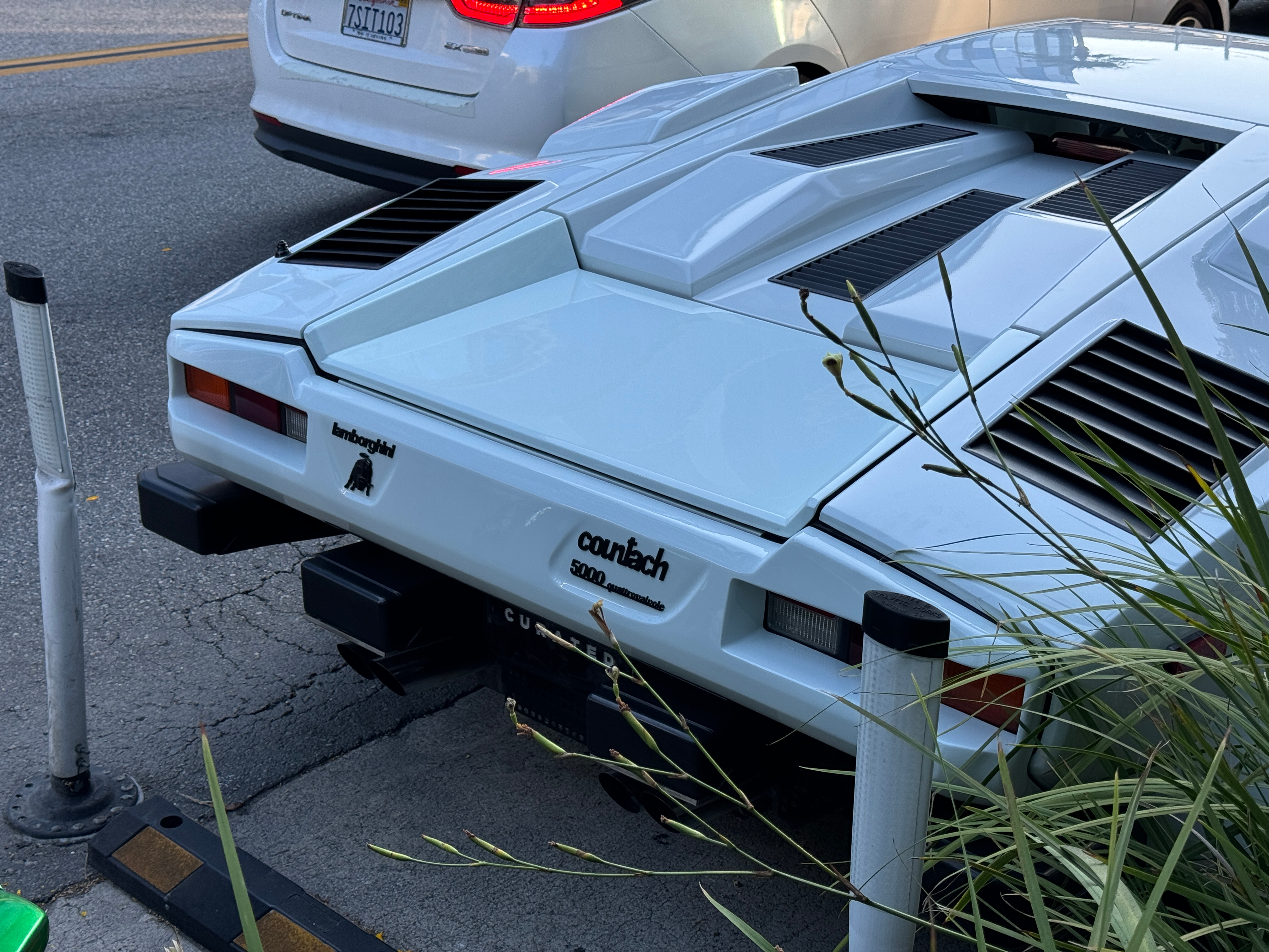 Rear bumper of a white Lamborghini Countach