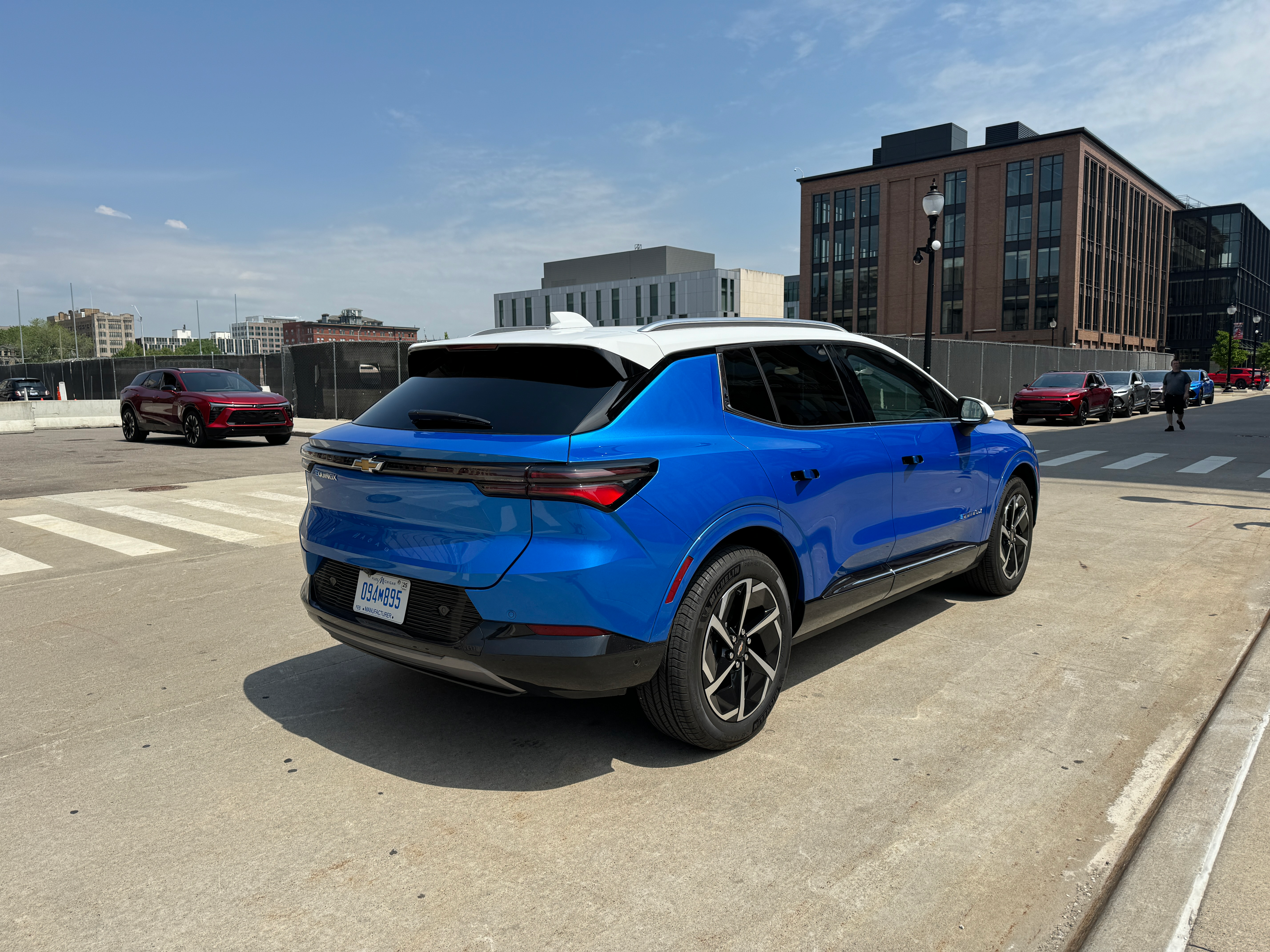 Rear 3/4 view of a blue 2024 Chevrolet Equinox EV