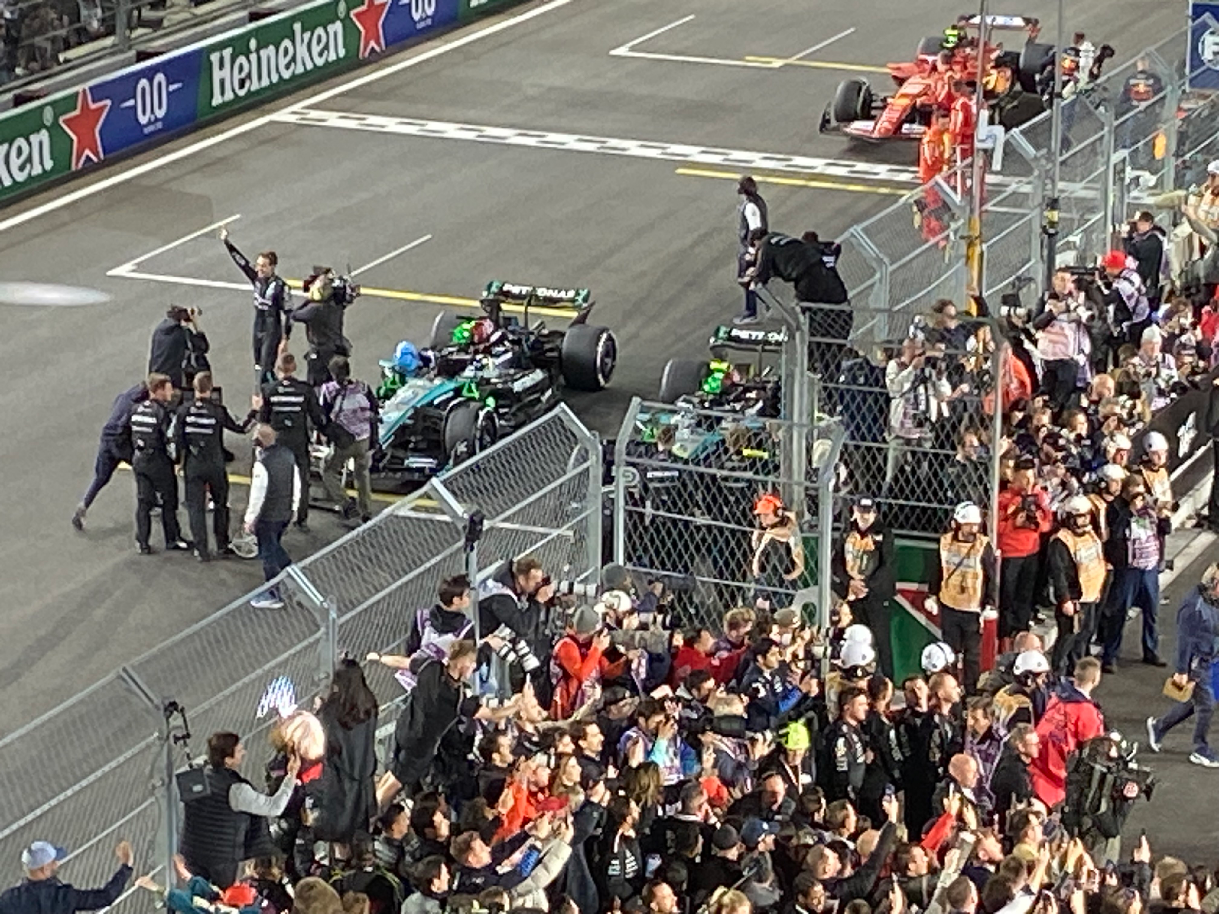 A photo of russell waving at the crowd after his win