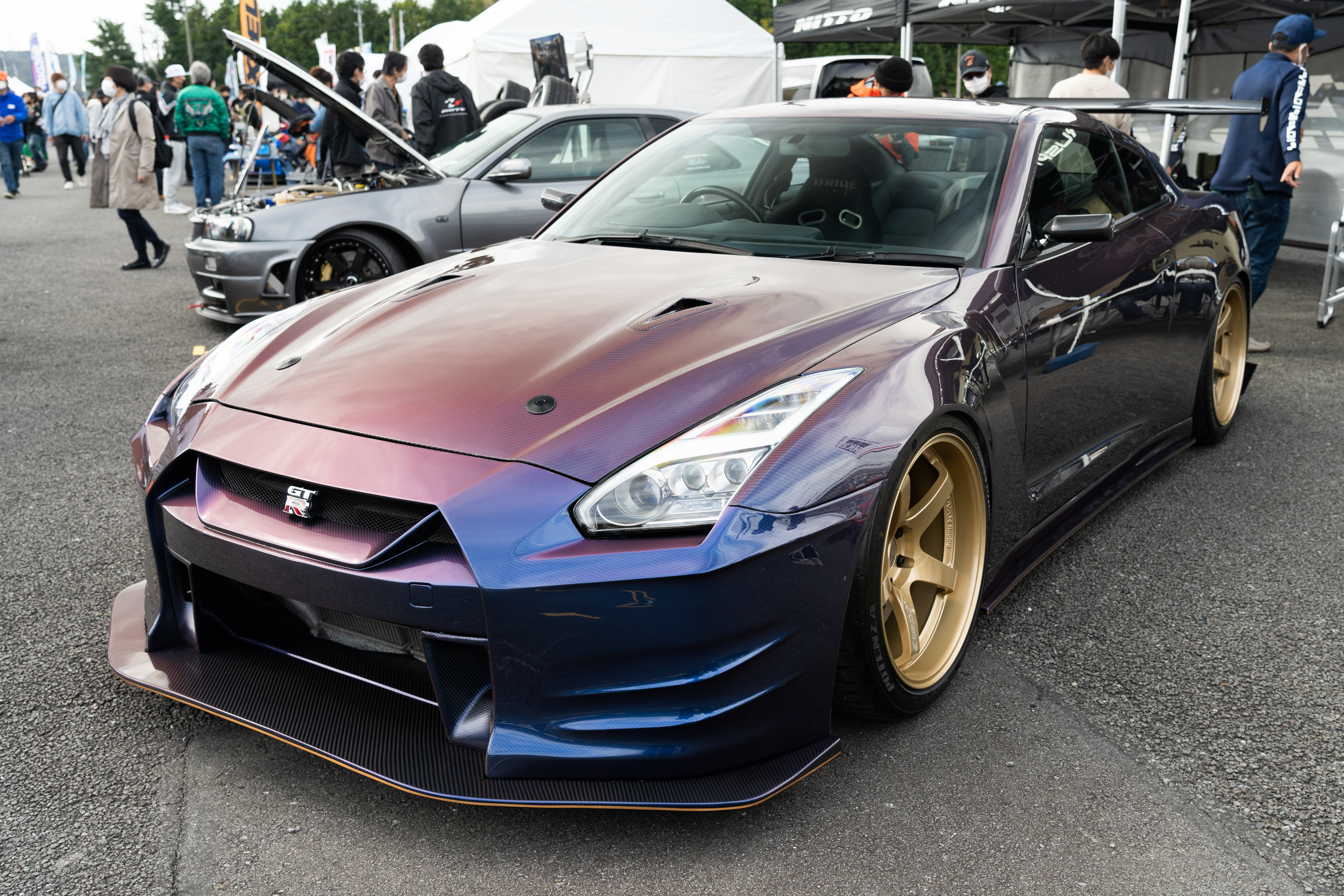 a purple r35 nissan gt-r with full carbon fiber bodywork