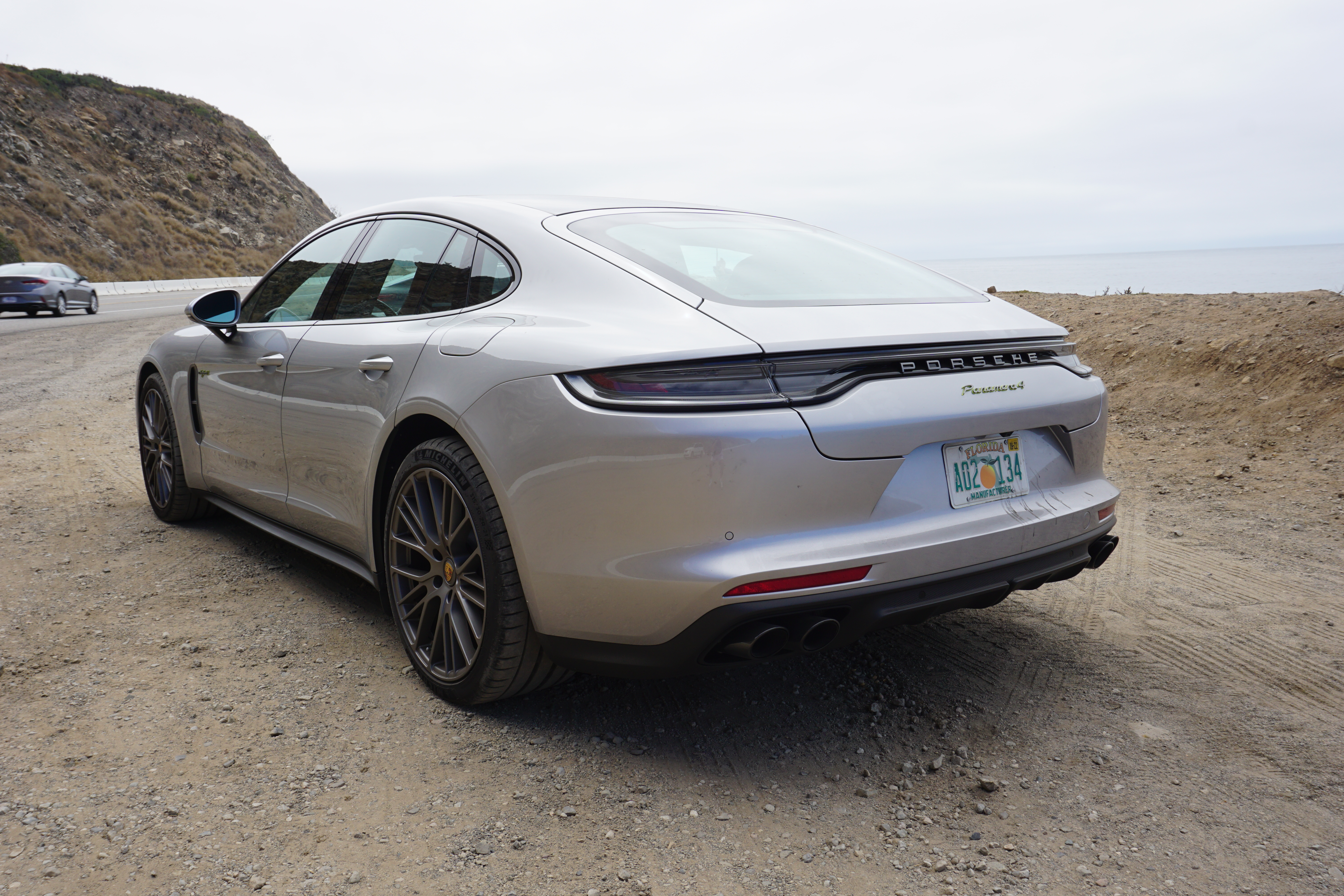 A silver 2022 Porsche Panamera 4 E-Hybrid Platinum Edition