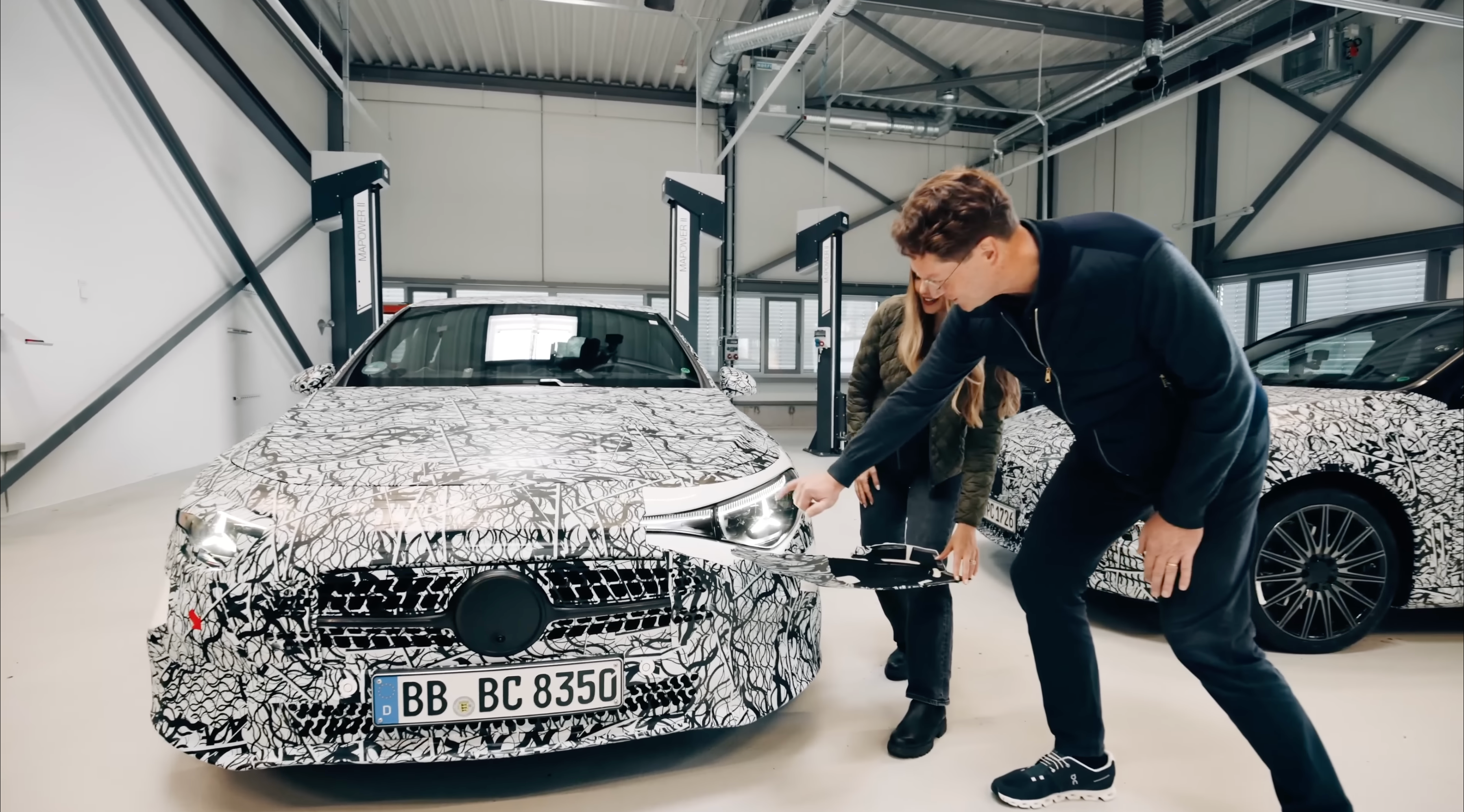 Front end of a camouflaged Mercedes-Benz CLA