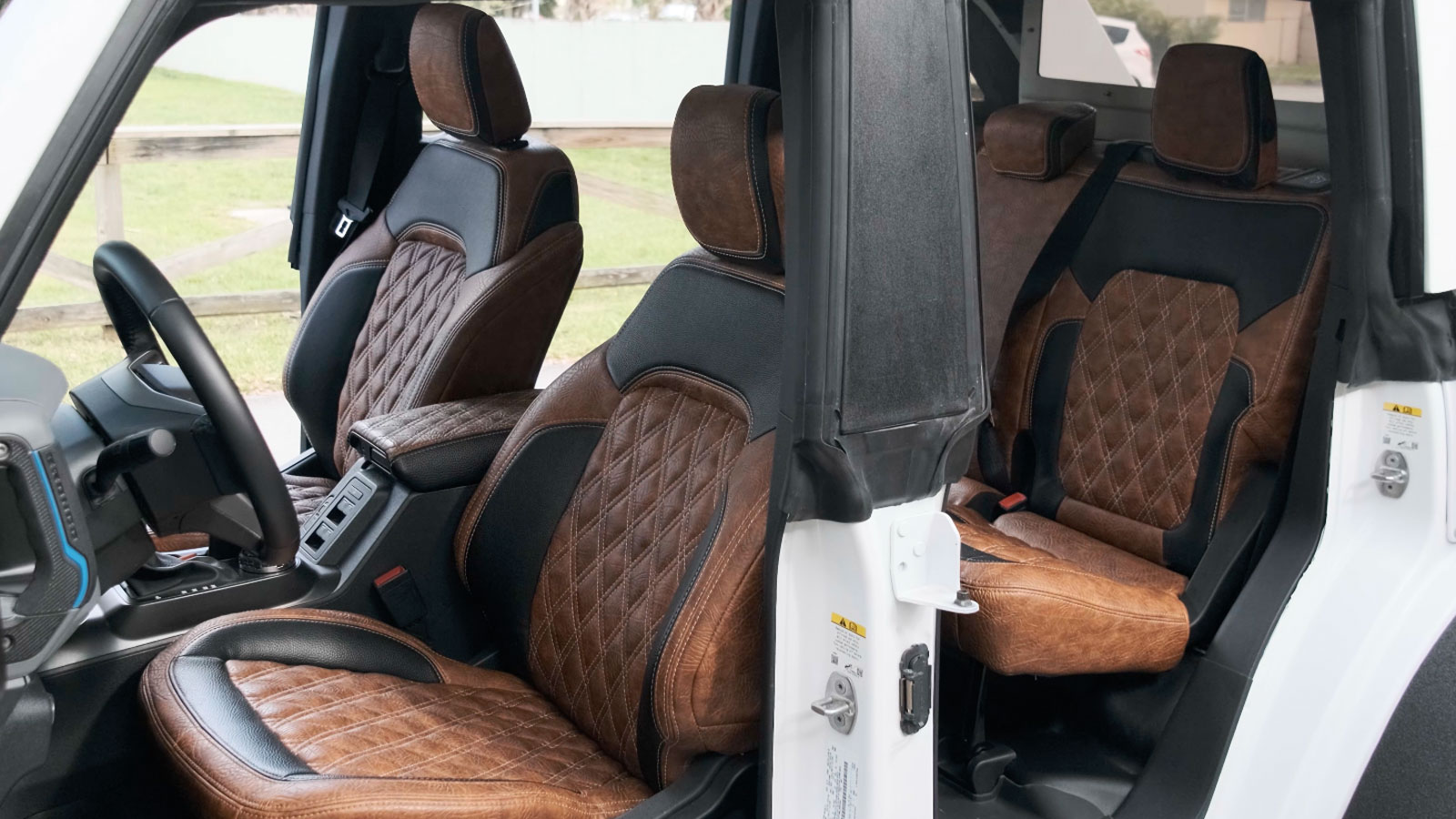 The black and brown interior of the Dark Horse truck. 