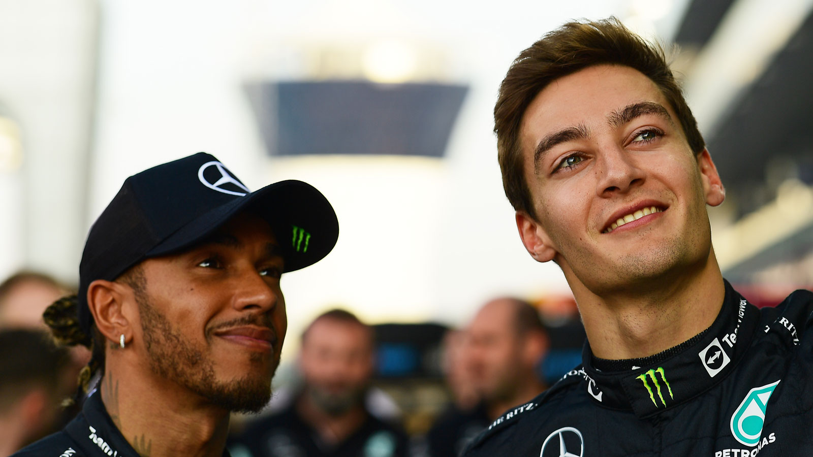 A photo of Lewis Hamilton and George Russell. 