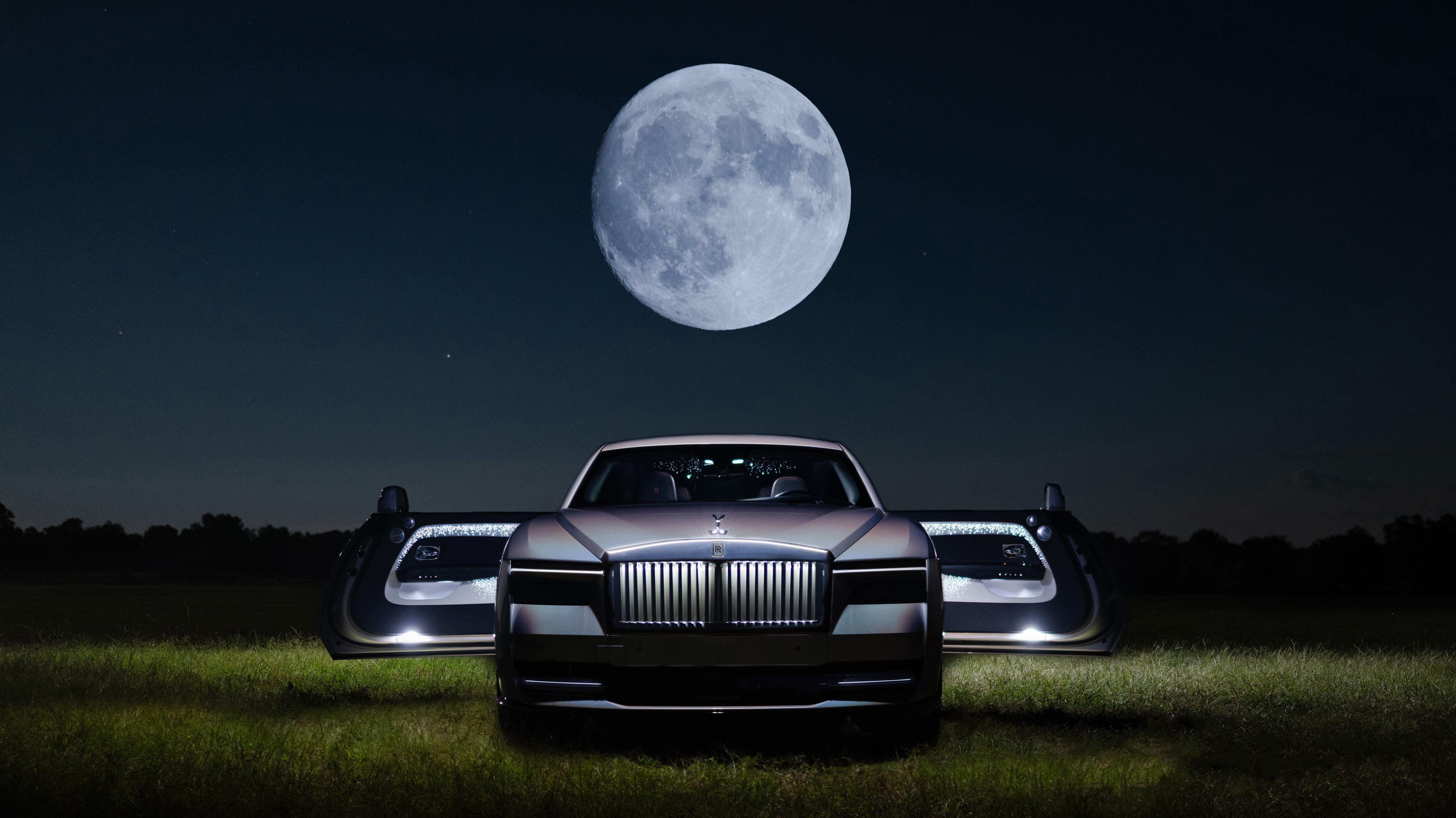 Front view of the rainbow Rolls-Royce Spectre Lunaflair with the moon in the background