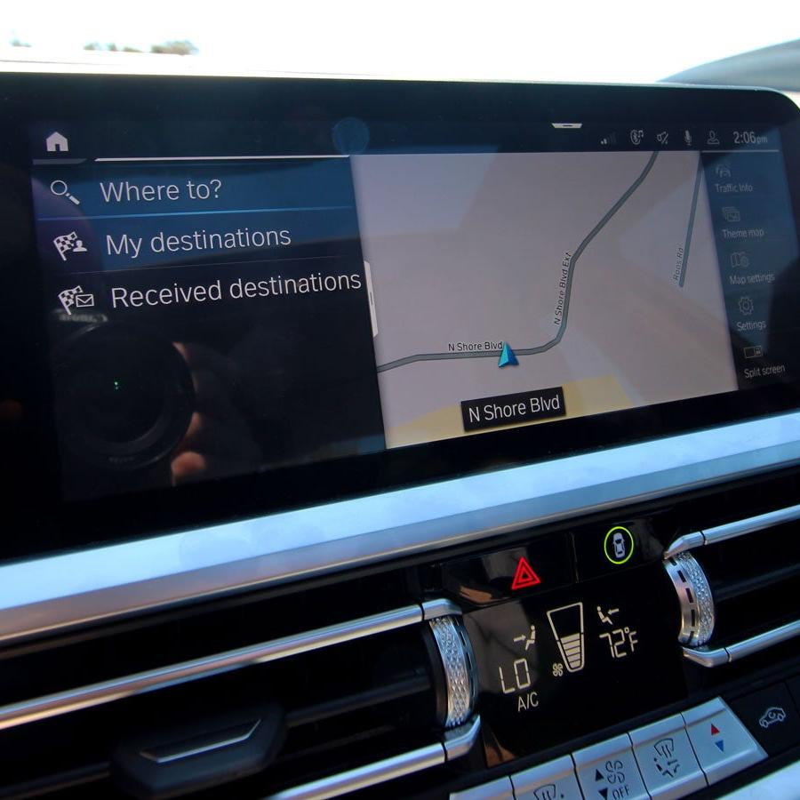 A photo of the screen in the front of the BMW 330e. 