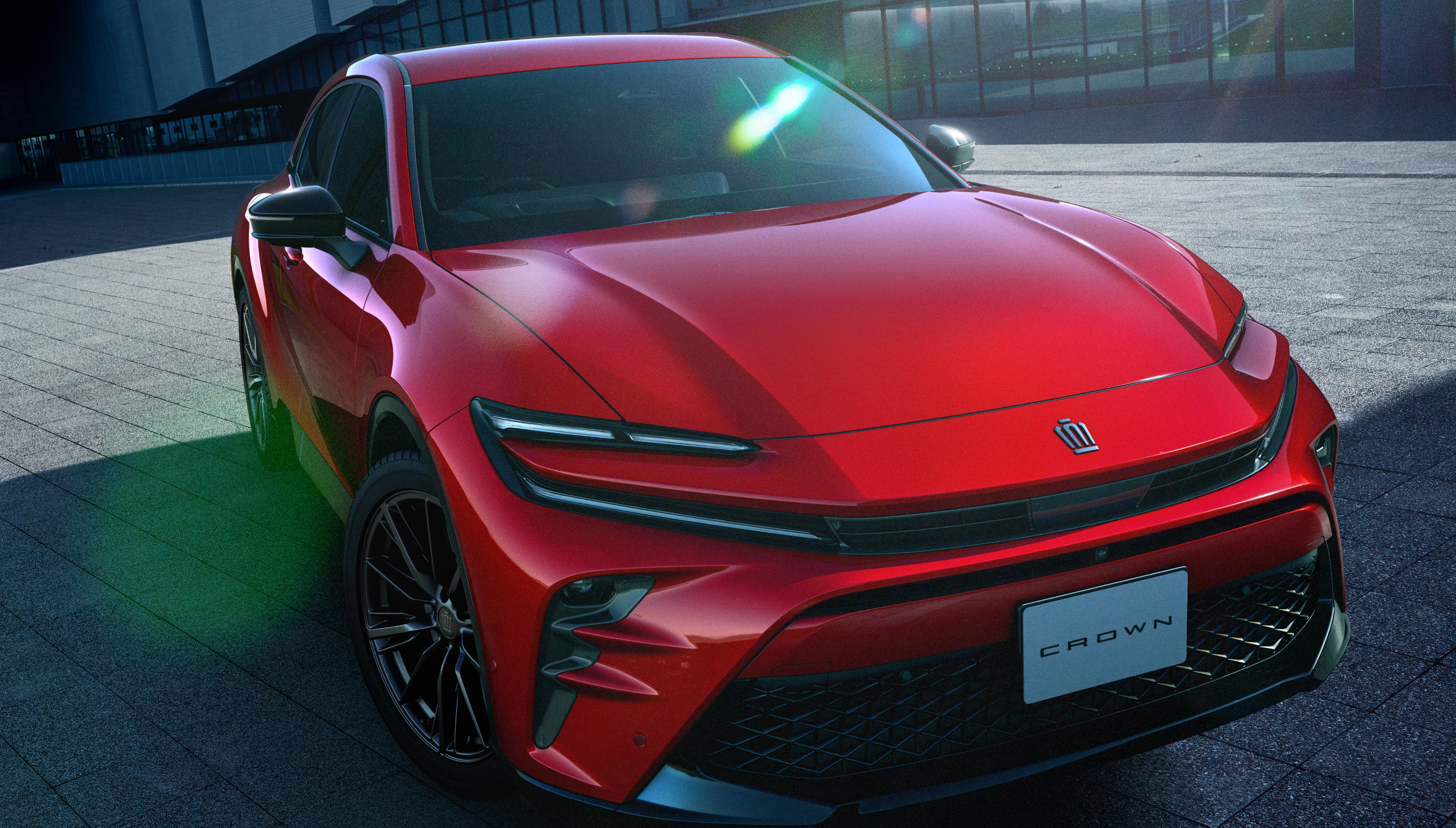 Front detail view of a red Toyota Crown Sport