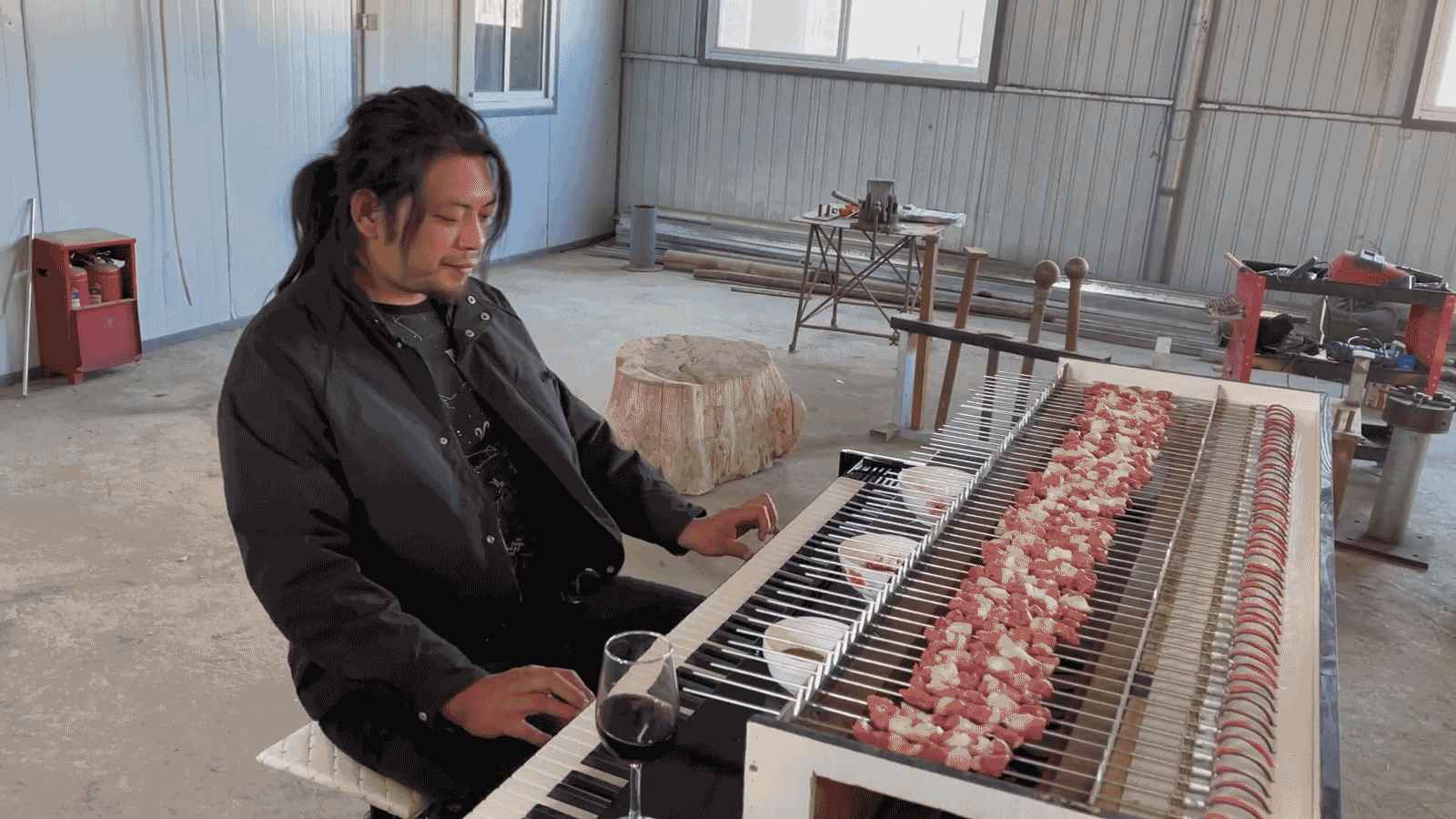 The piano grill car's creator plays each key on the keyboard 