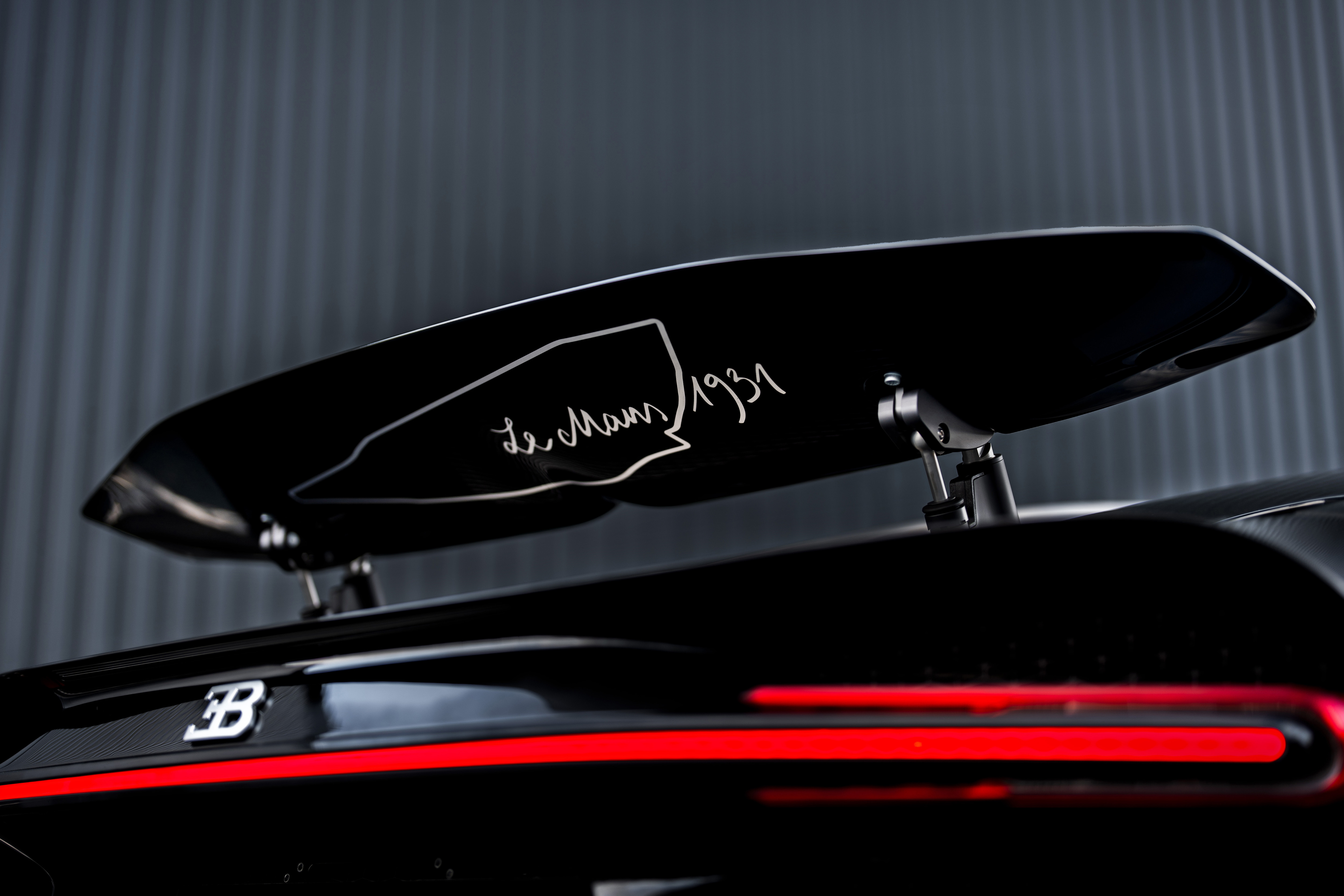 Underside of the rear wing of a black Bugatti Chiron Super Sport