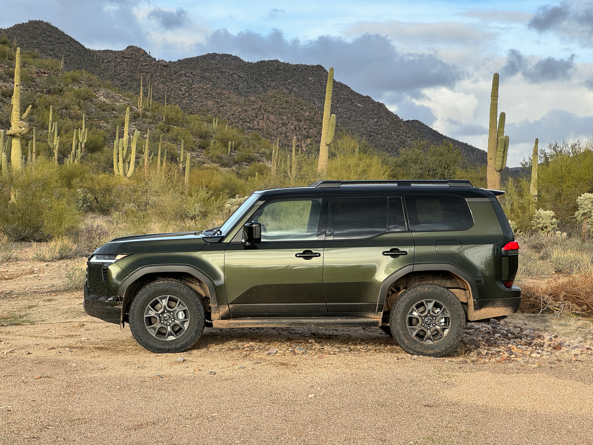 Side view of a green 2024 Lexus GX 550 Overtrail