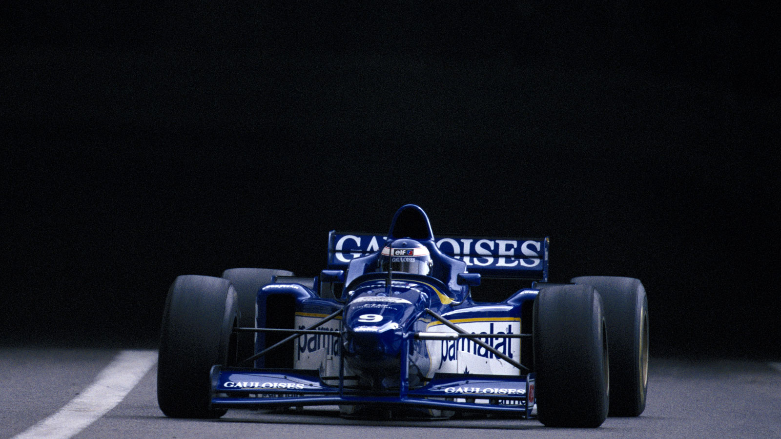 A phot of Olivier Panis driving his F1 car out of the tunnel in Monaco. 