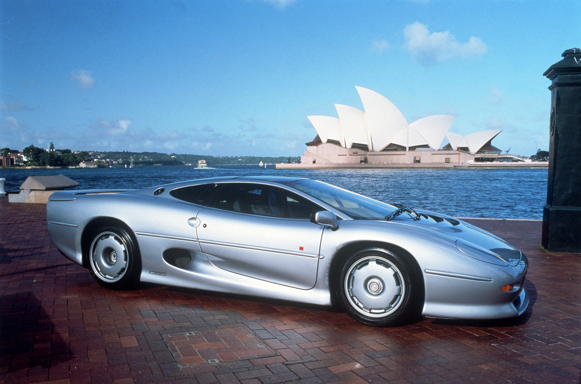 Front quarter image of a silver Jaguar XJ220.