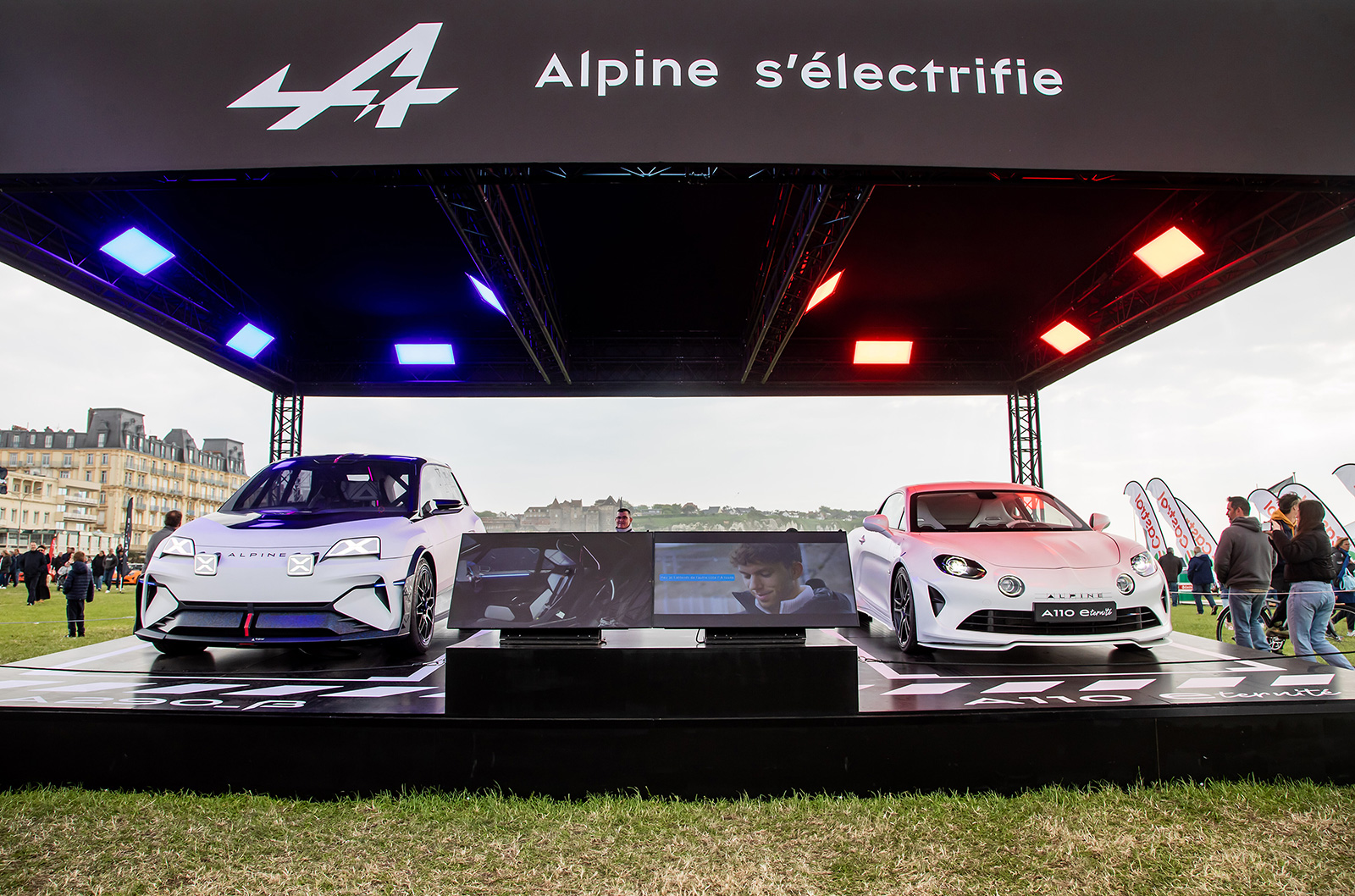 Front view of the Alpine A290_β concept on stage at left, next to the electric Alpine A110 E-ternité concept