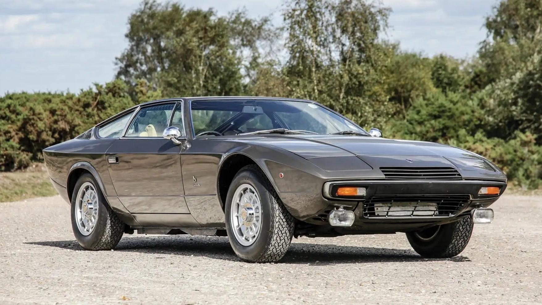 Front 3/4 view of a grey Maserati Khamsin