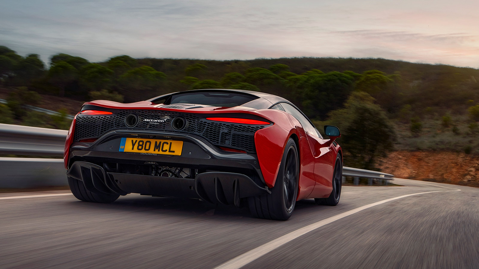 Rear view of McLaren Artura in Burnt Orange