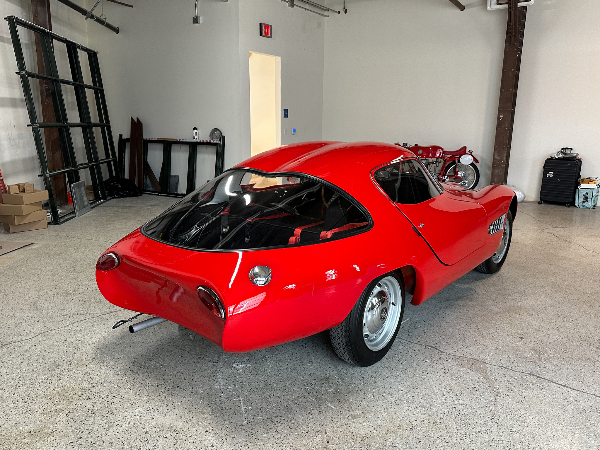 Rear 3/4 view of a red Luigi Colani Abarth-Alfa Romeo