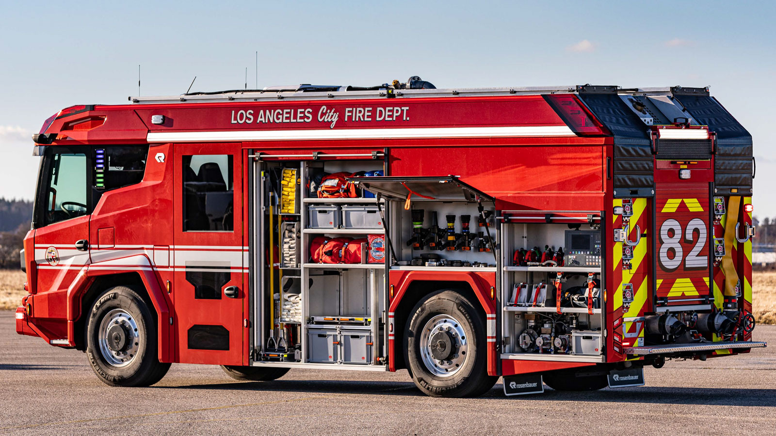 An image of the LAFD's Rosenbauer RTX fire truck with its compartments open. 