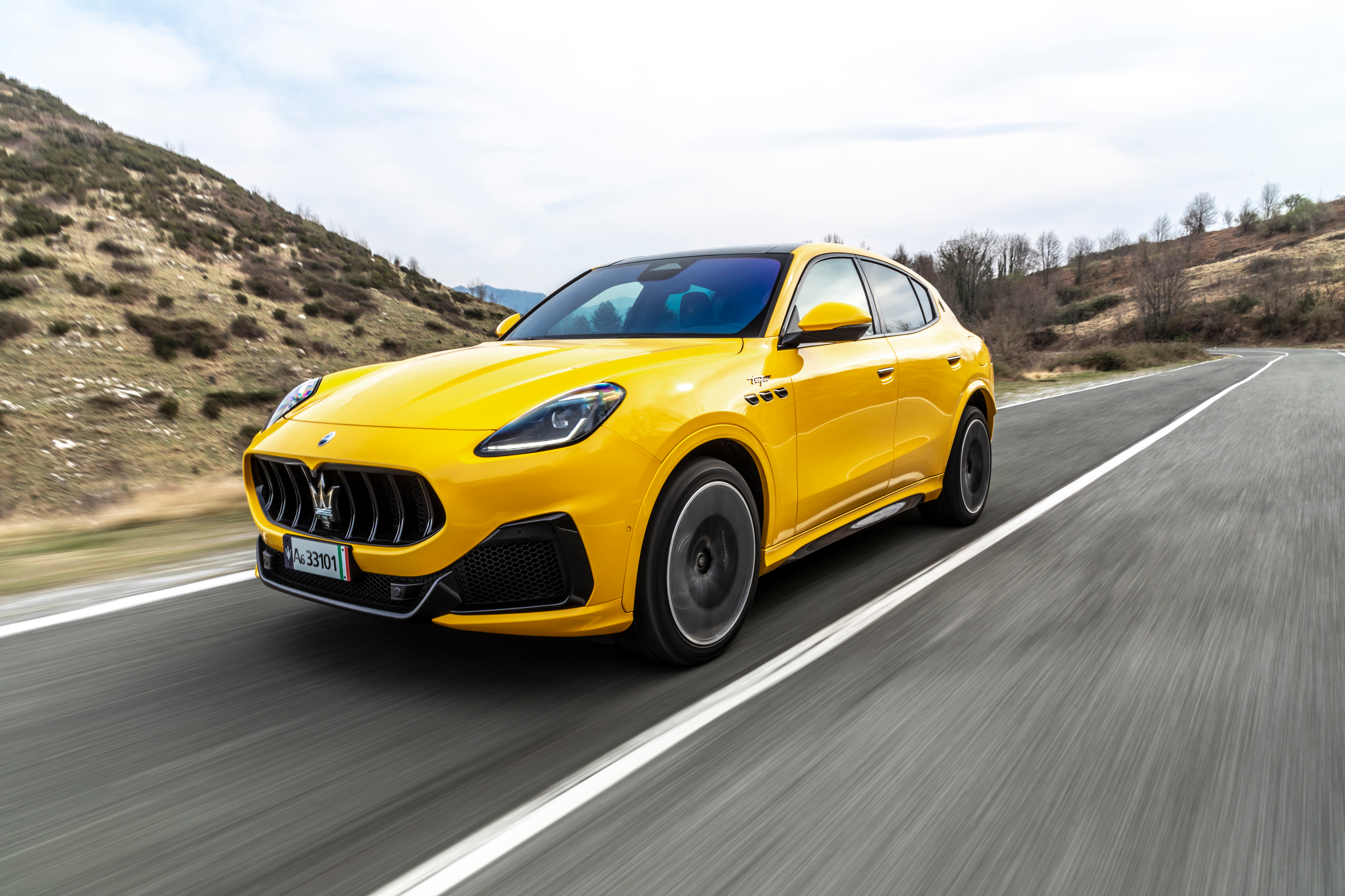 Front three quarter view of a yellow 2023 Maserati Grecale Trofeo