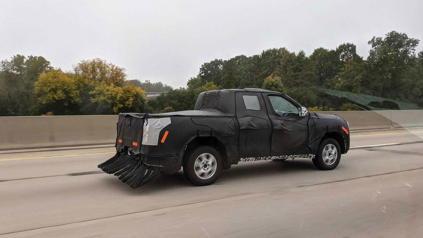 A disguised Toyota Tacoma truck on the highway 