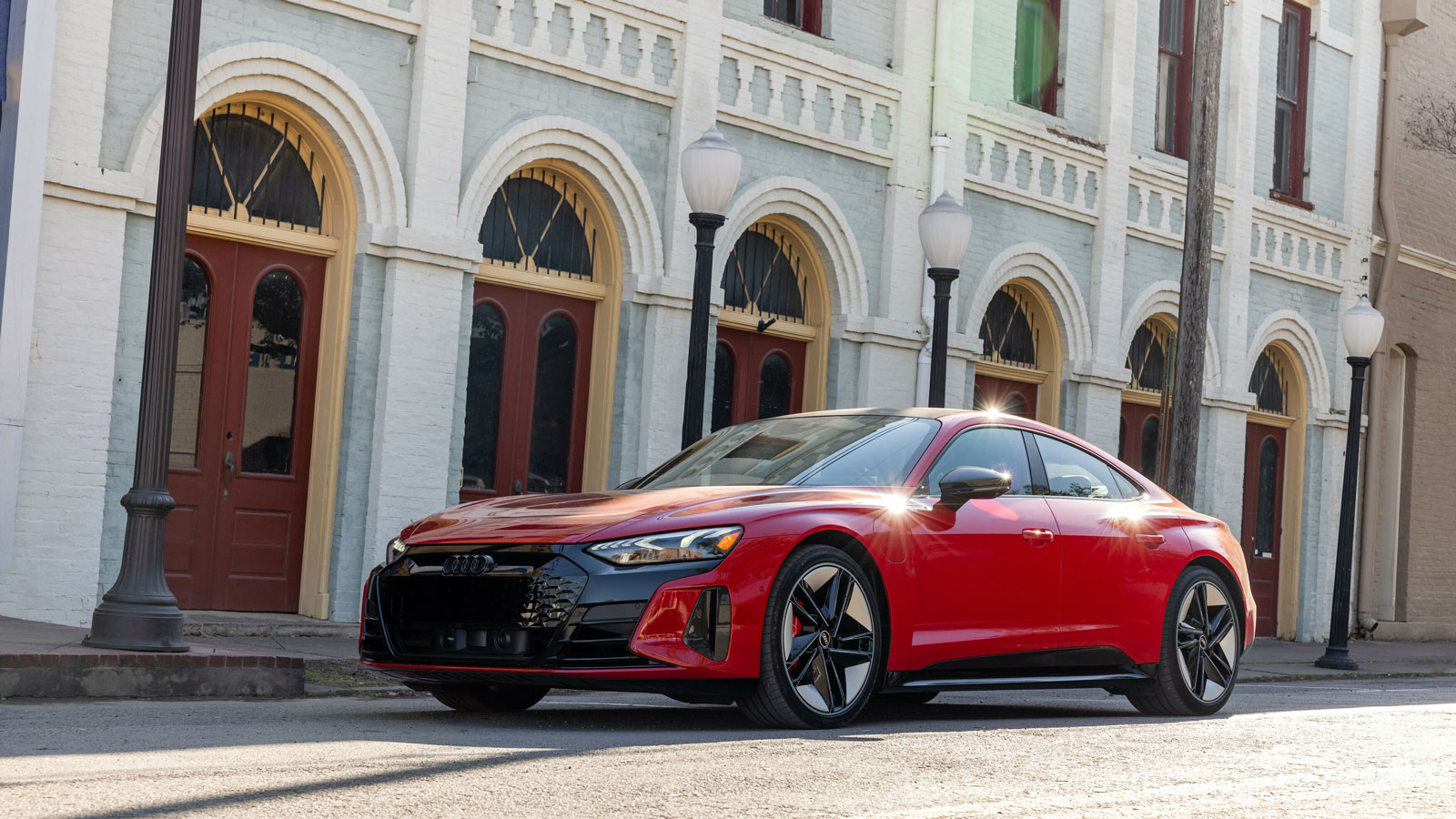 A photo of a red Audi E-Tron GT electric car. 