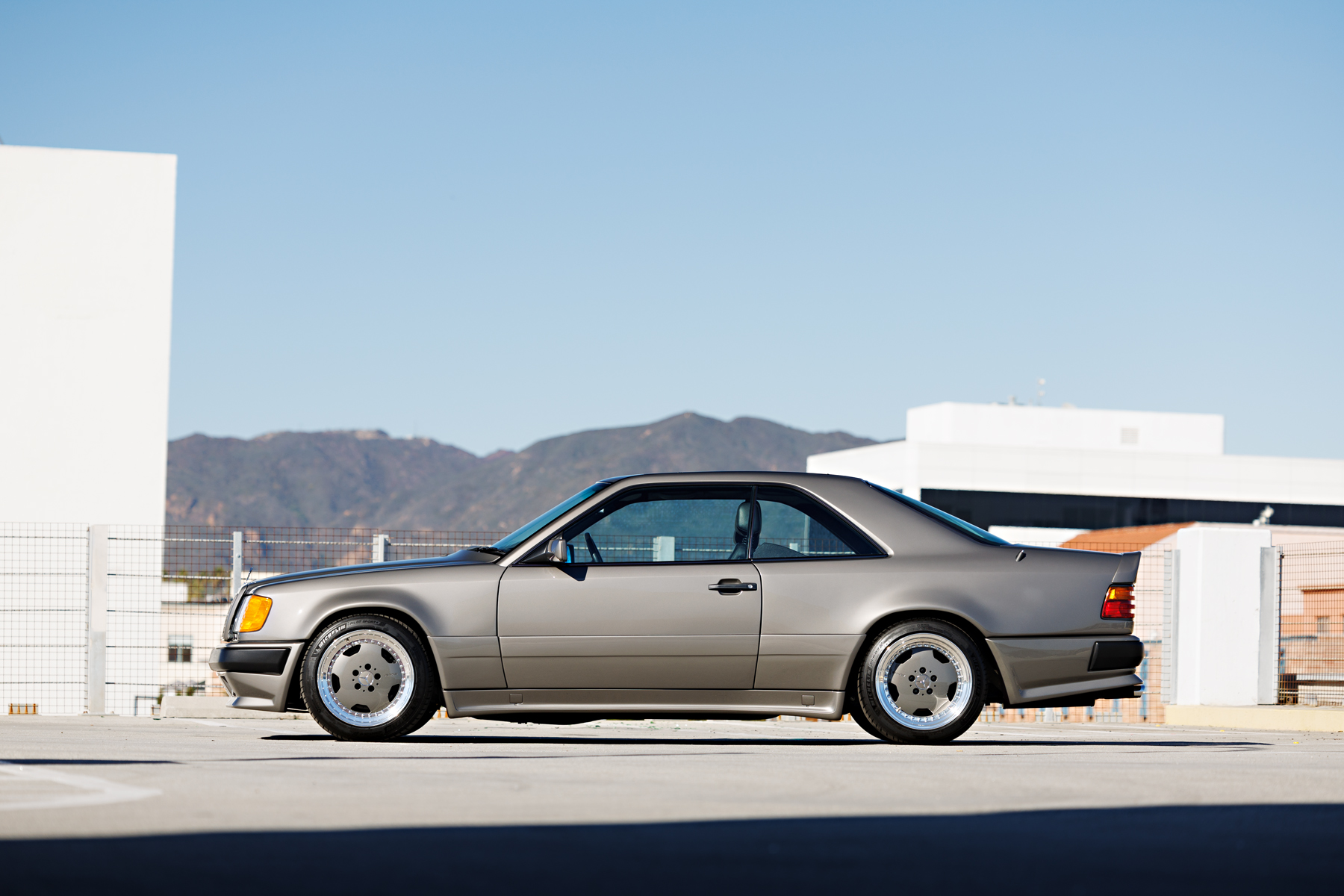 Side view of a grey Mercedes-Benz AMG 300CE 6.0 Hammer