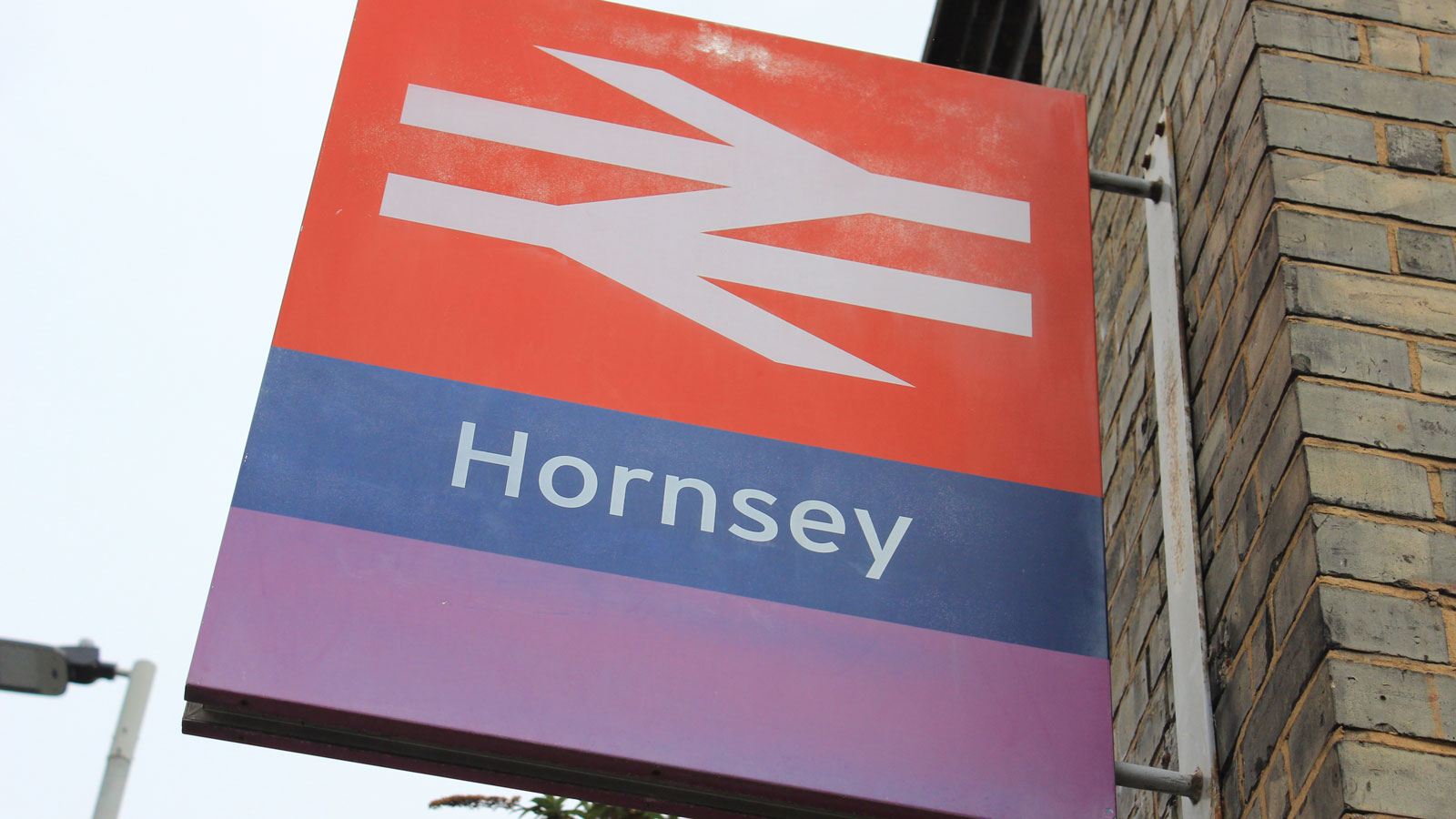 A photo of the sign at Hornsey Station in North London. 