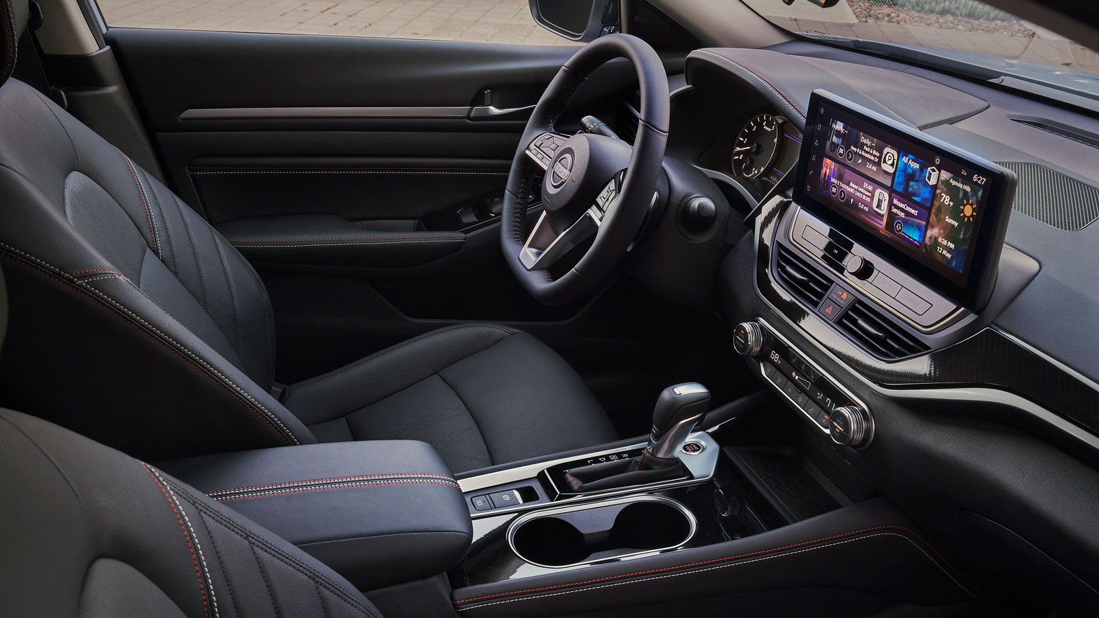 A photo of the driver seat and steering wheel in the new Nissan Altima. 