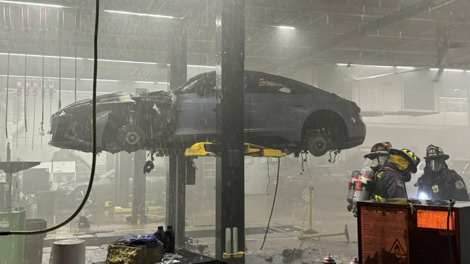 A photo of an Audi E-Tron GT after a battery fire. 