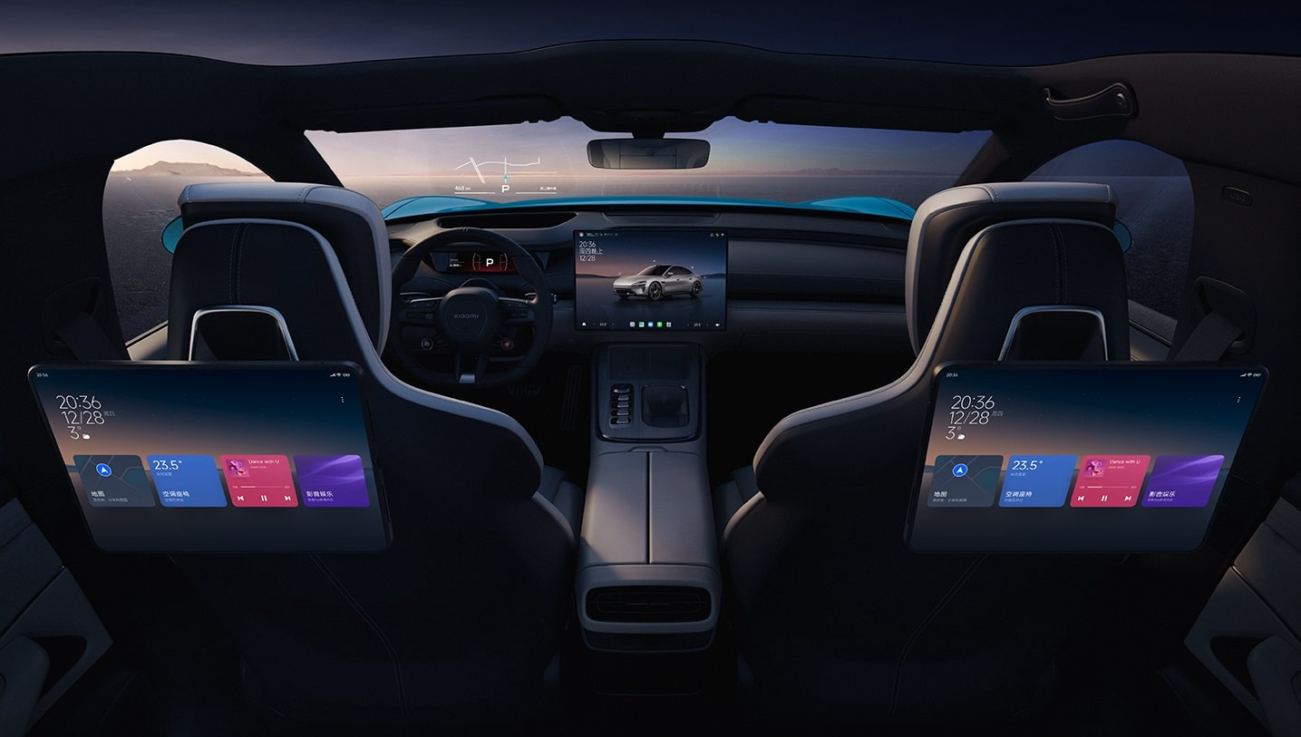 Darkened interior view of the rear seats and dashboard of a Xiaomi SU7