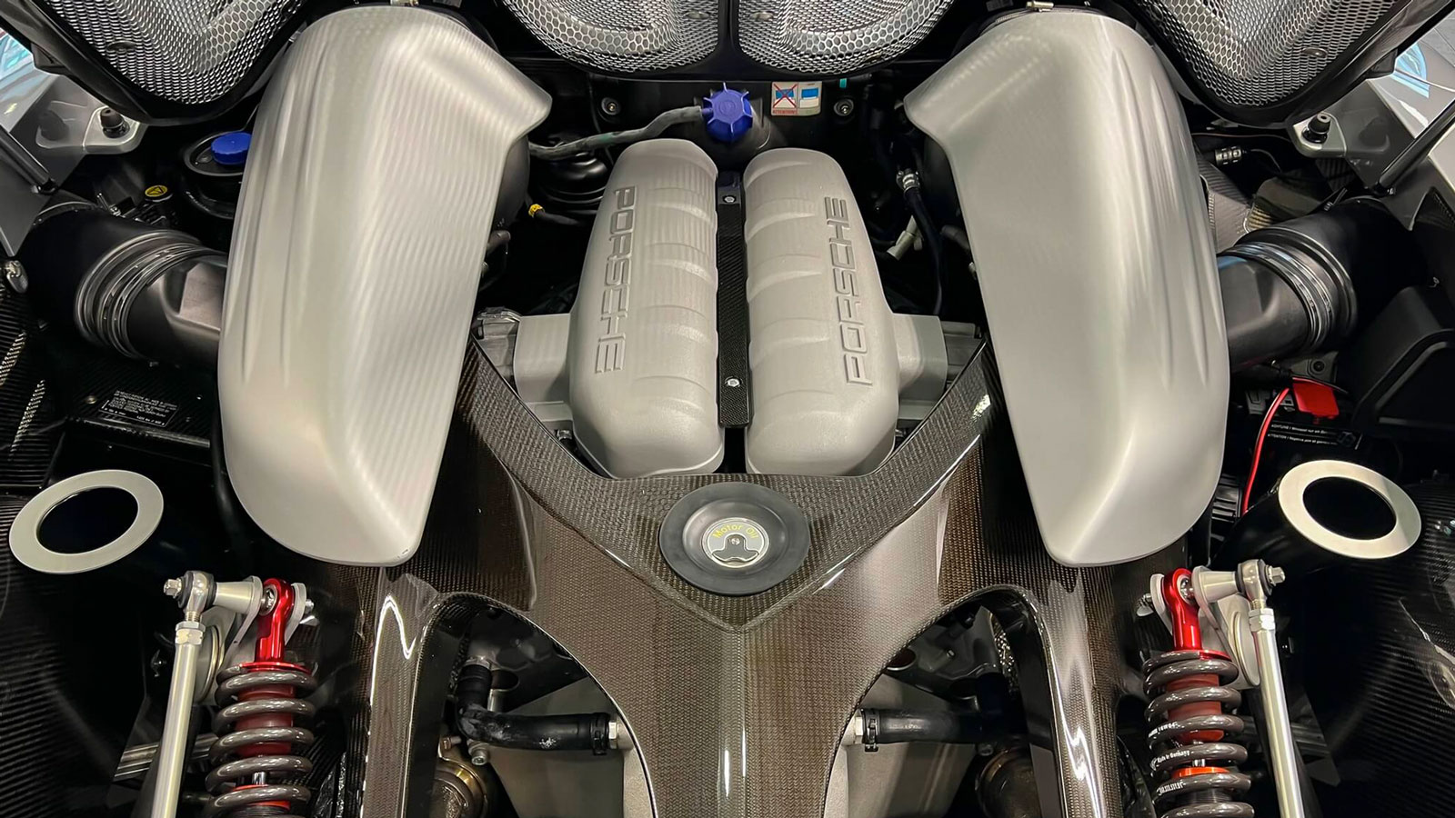 The engine bay of the Carrera GT housing its V10 engine