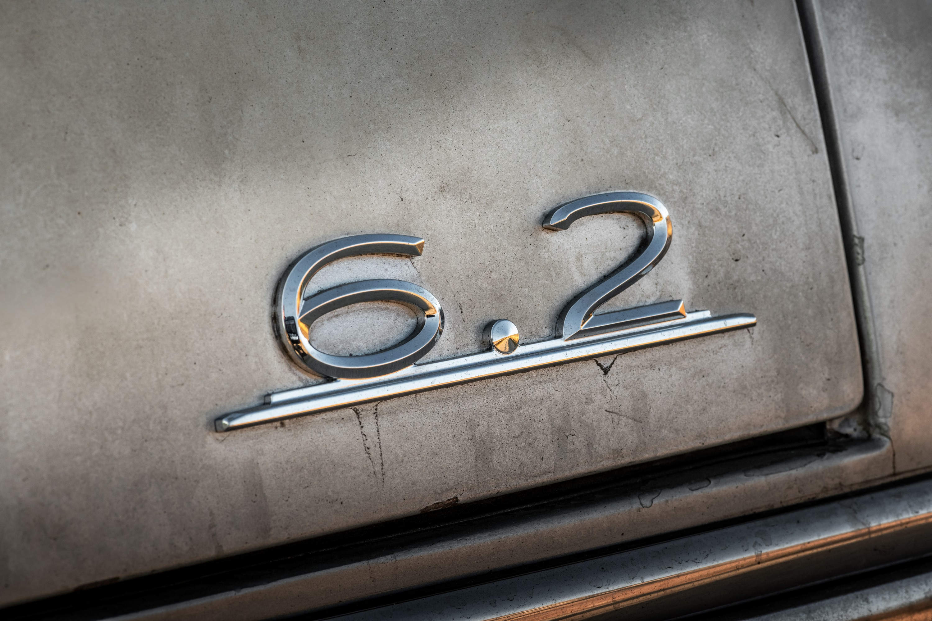 A 6.2 logo in the style of Mercedes original badging on the 300SEL 6.3