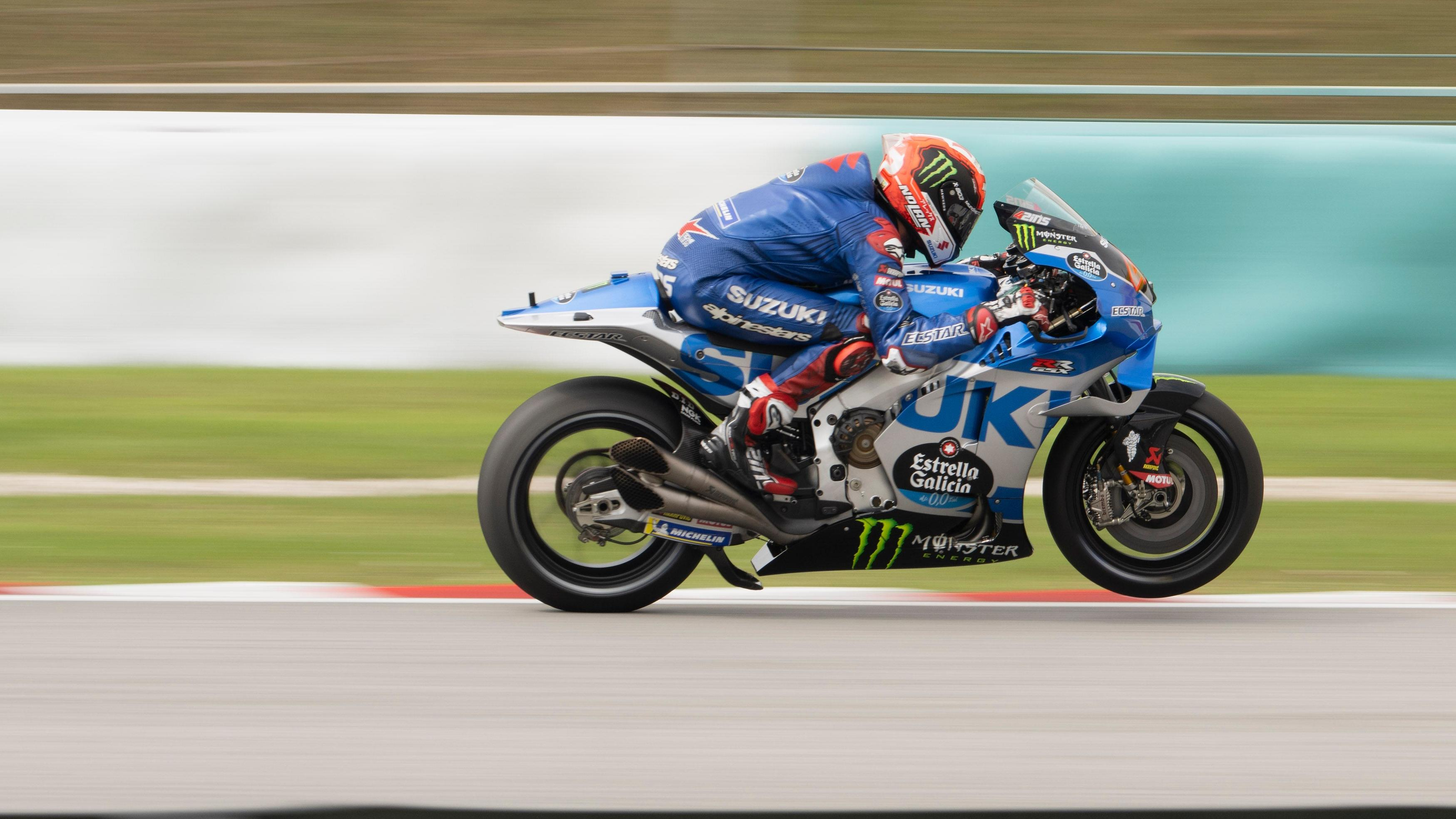 Alex Rins accelerating his Suzuki GSX-RR out of a corner