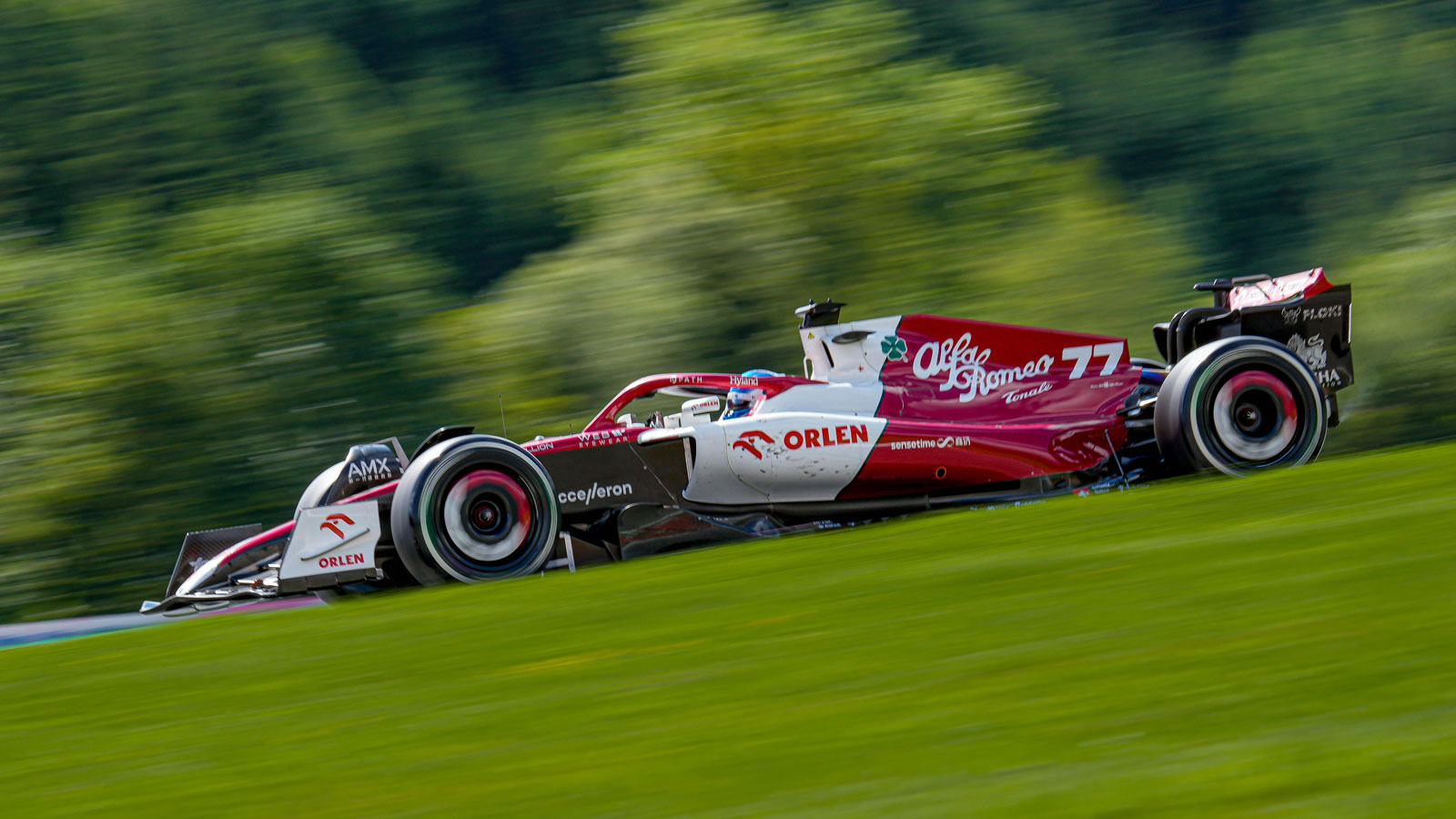 A photo of Valtteri Bottas driving his Alfa Romeo F1 car in Austria. 