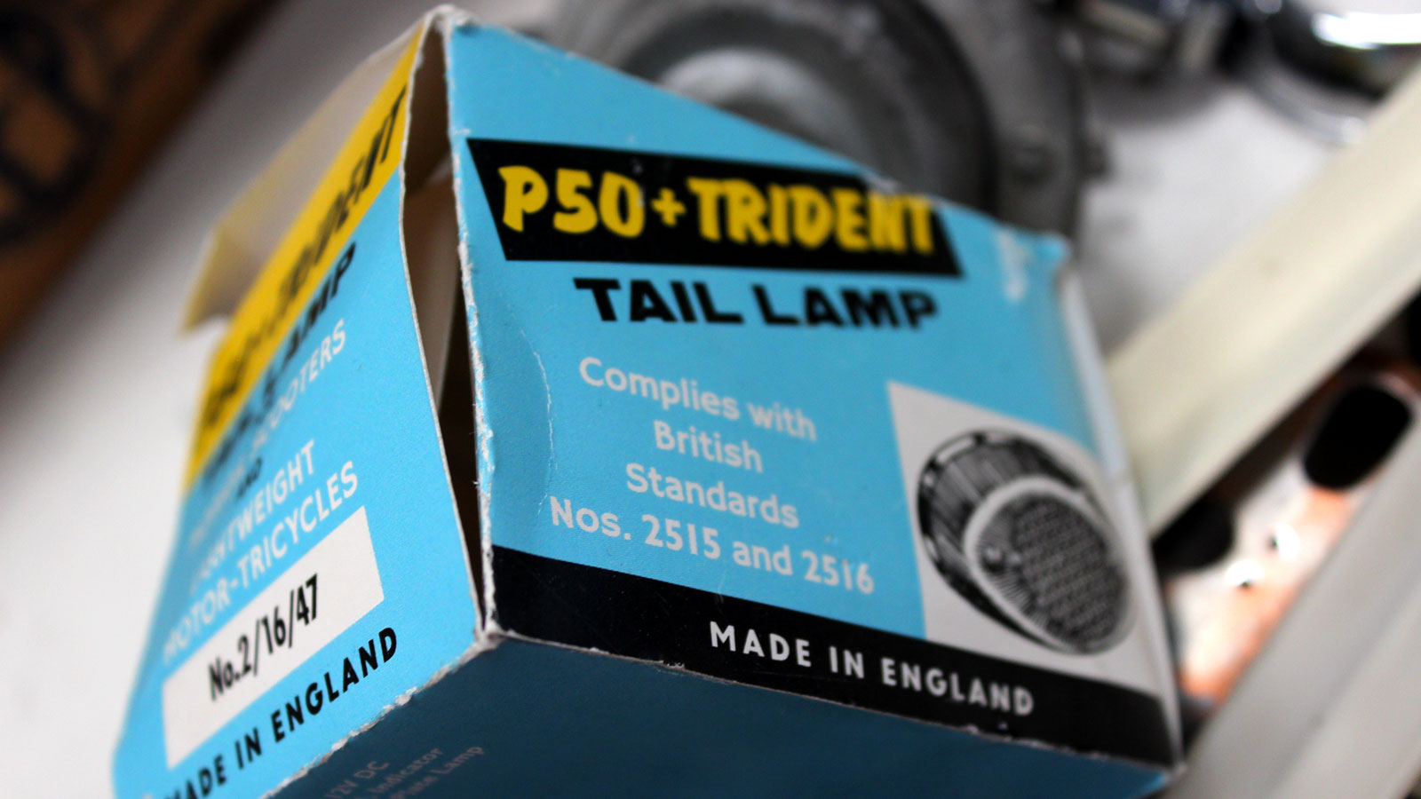 A photo of a box for an original Peel Cars tail lamp. 