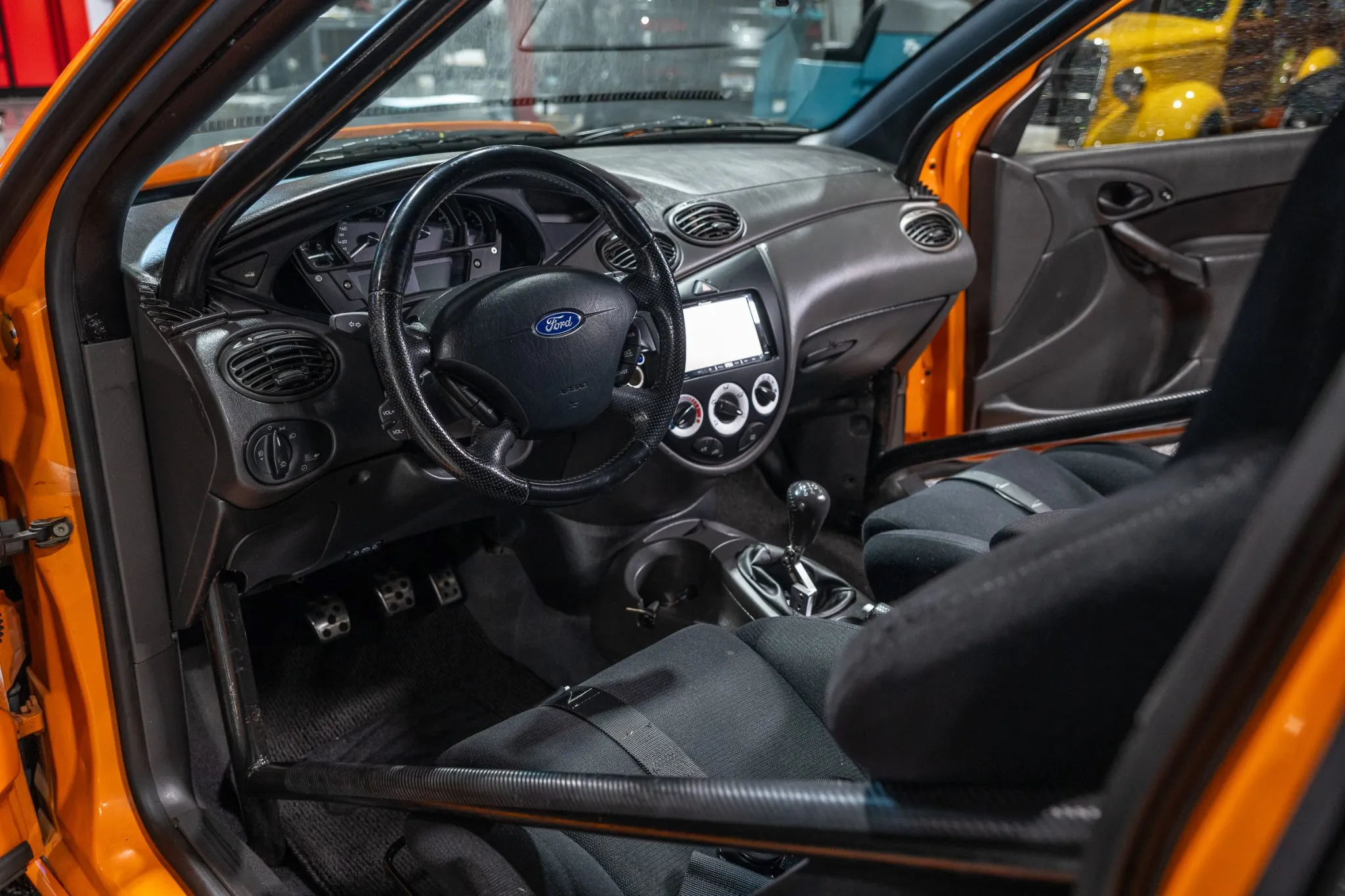 A shot of the interior of the focus showing its custom carbon roll cage and recaro seats